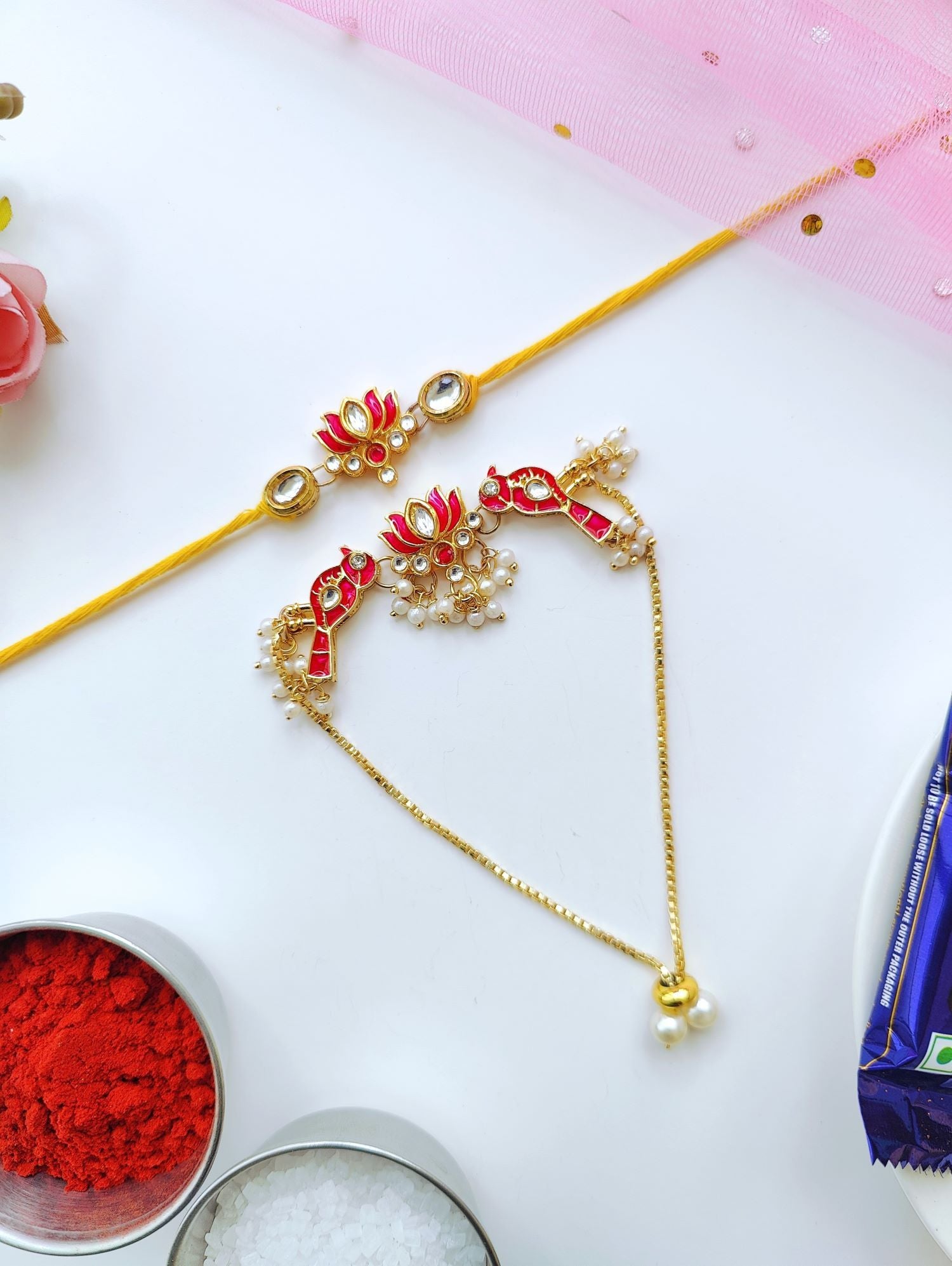 Handmade Bhaiya Bhabhi Rakhi set with lotus design, Kundan stones, pearl beads; traditional rakhi for brother 2026