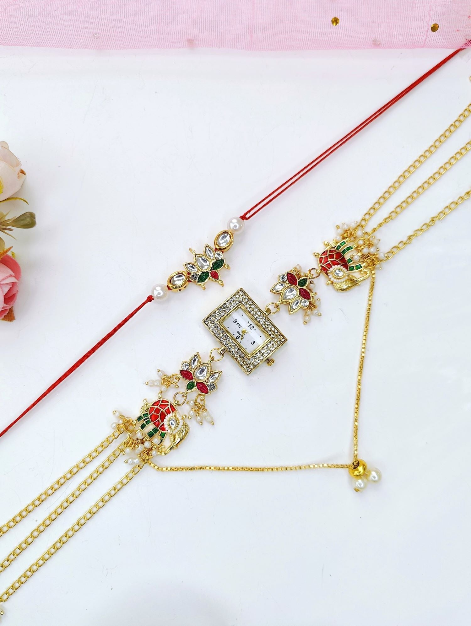 elephant motif gold bracelet watch rakhi, pink green kundan handmade