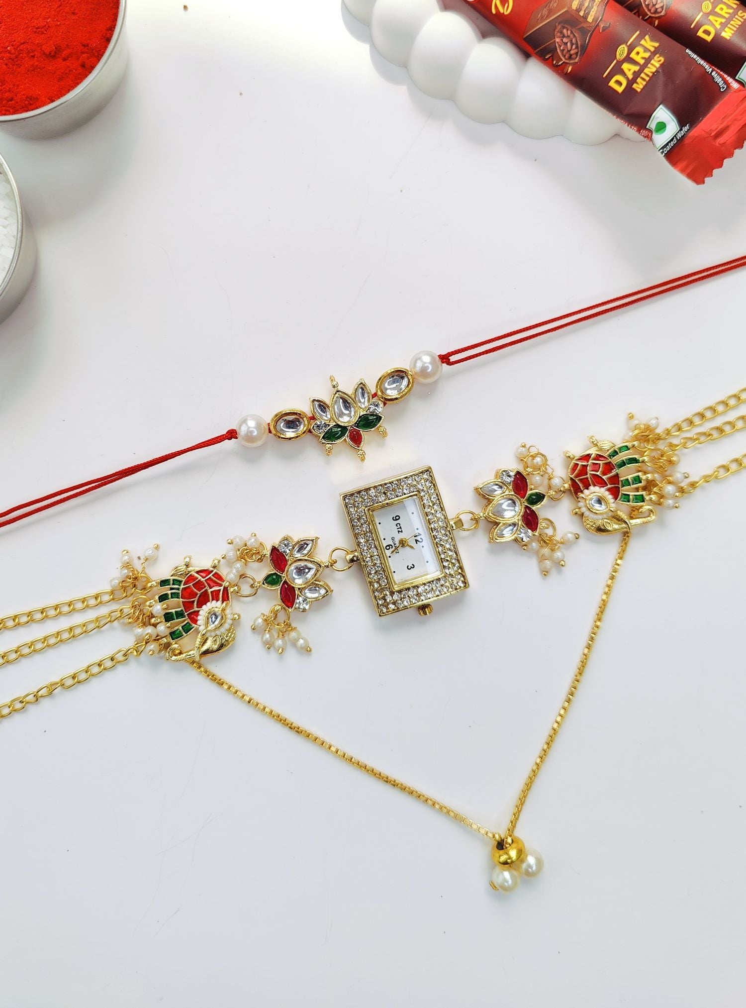 elephant motif gold bracelet watch rakhi, pink green kundan handmade