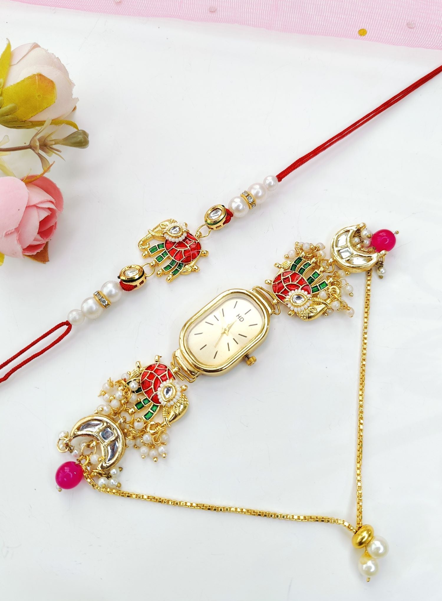 crescent moon rakhi combo set with elephant motif gold bracelet watch