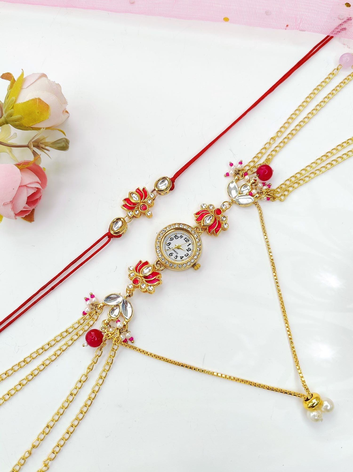 pink lotus rakhi with kundan and Kashmiri watch for bhaiya bhabhi