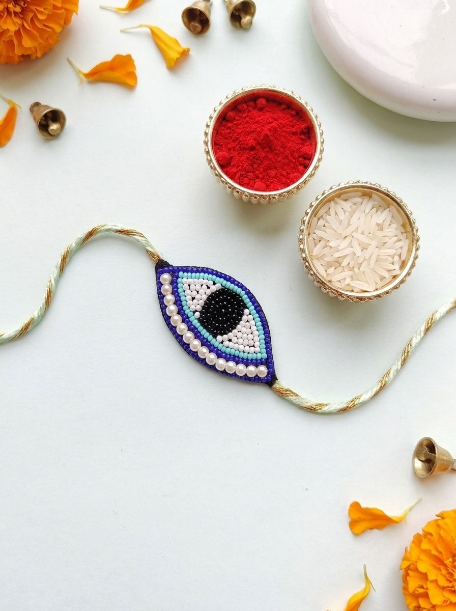 Handmade Beaded Evil Eye Rakhi – Unique Protection Band for Brothers 2026