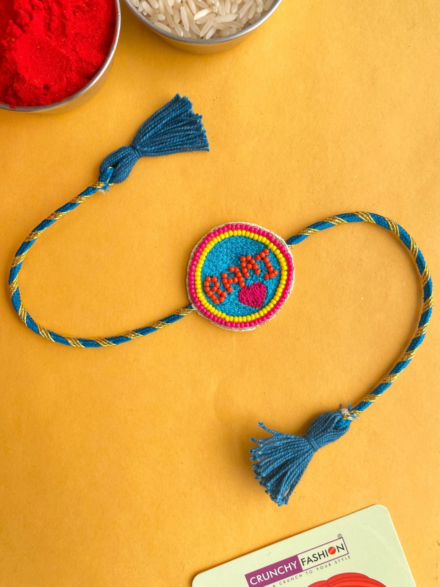 Handmade beaded Bhai Rakhi in blue color, adjustable and ideal for men, comes with Roli and Chawal for Raksha Bandhan 2024.