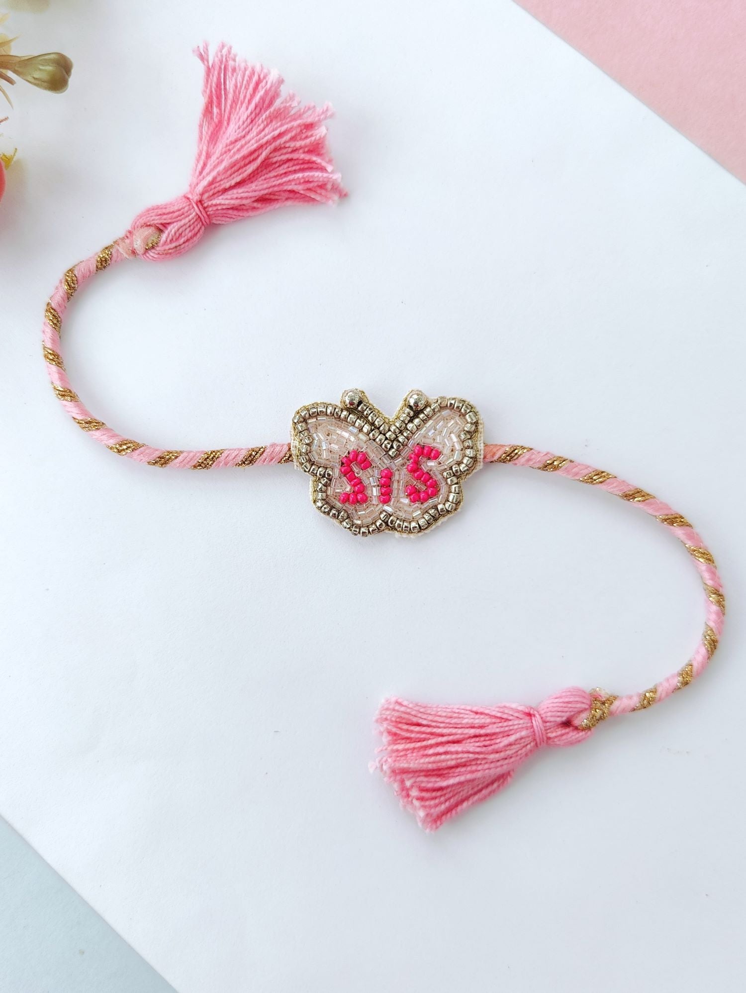 Handmade pink sis rakhi, cute butterfly sister rakhi 2026
