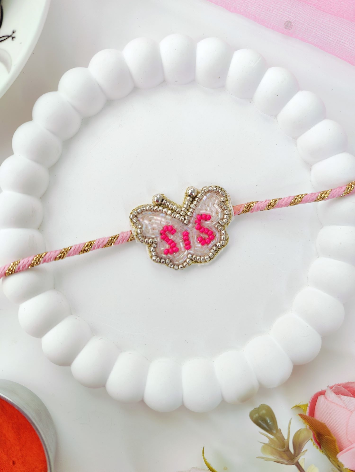Handmade pink sis rakhi, cute butterfly sister rakhi 2026