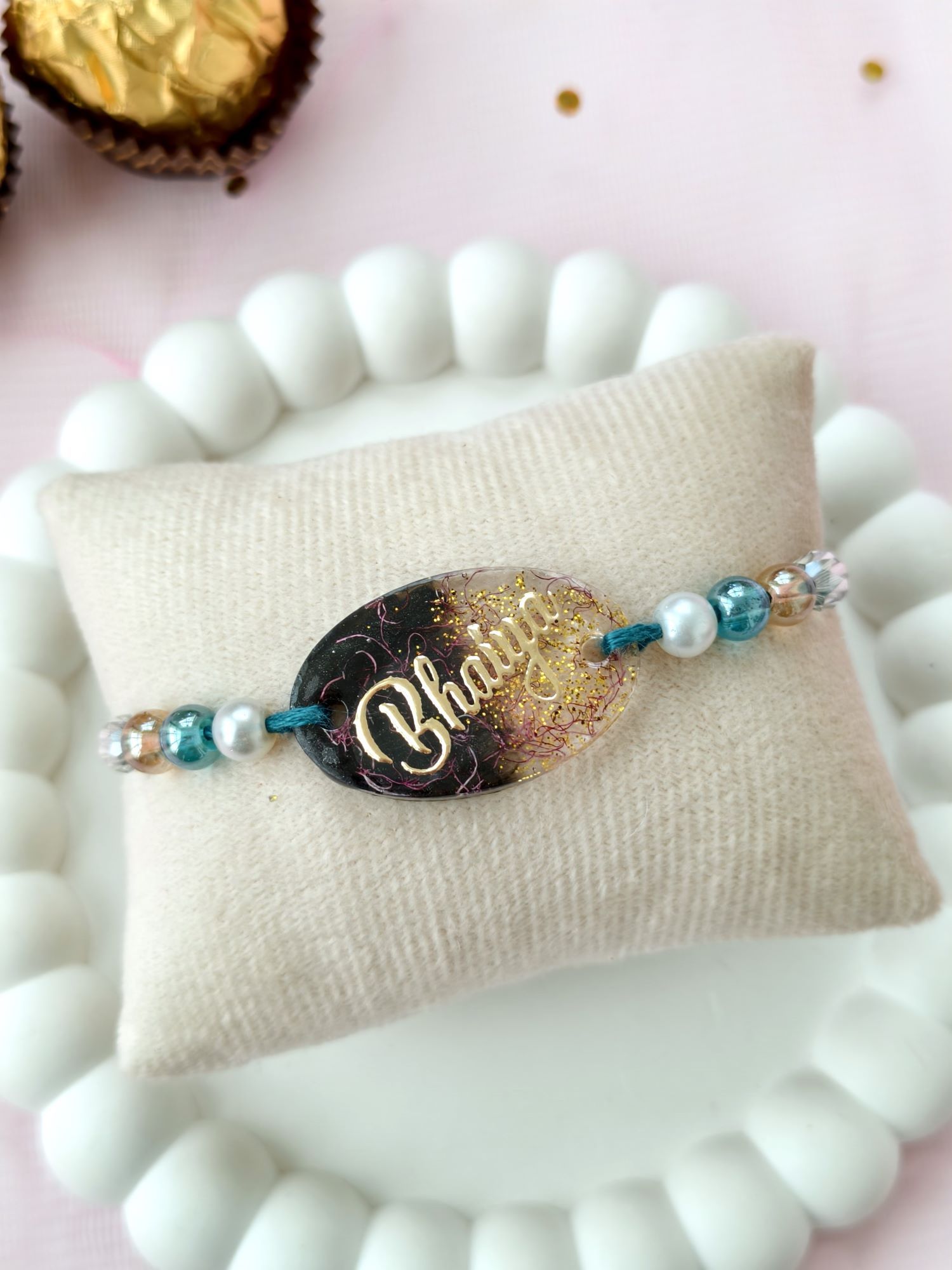 Handmade resin rakhi for brother with pearl beads, bhaiya rakhi