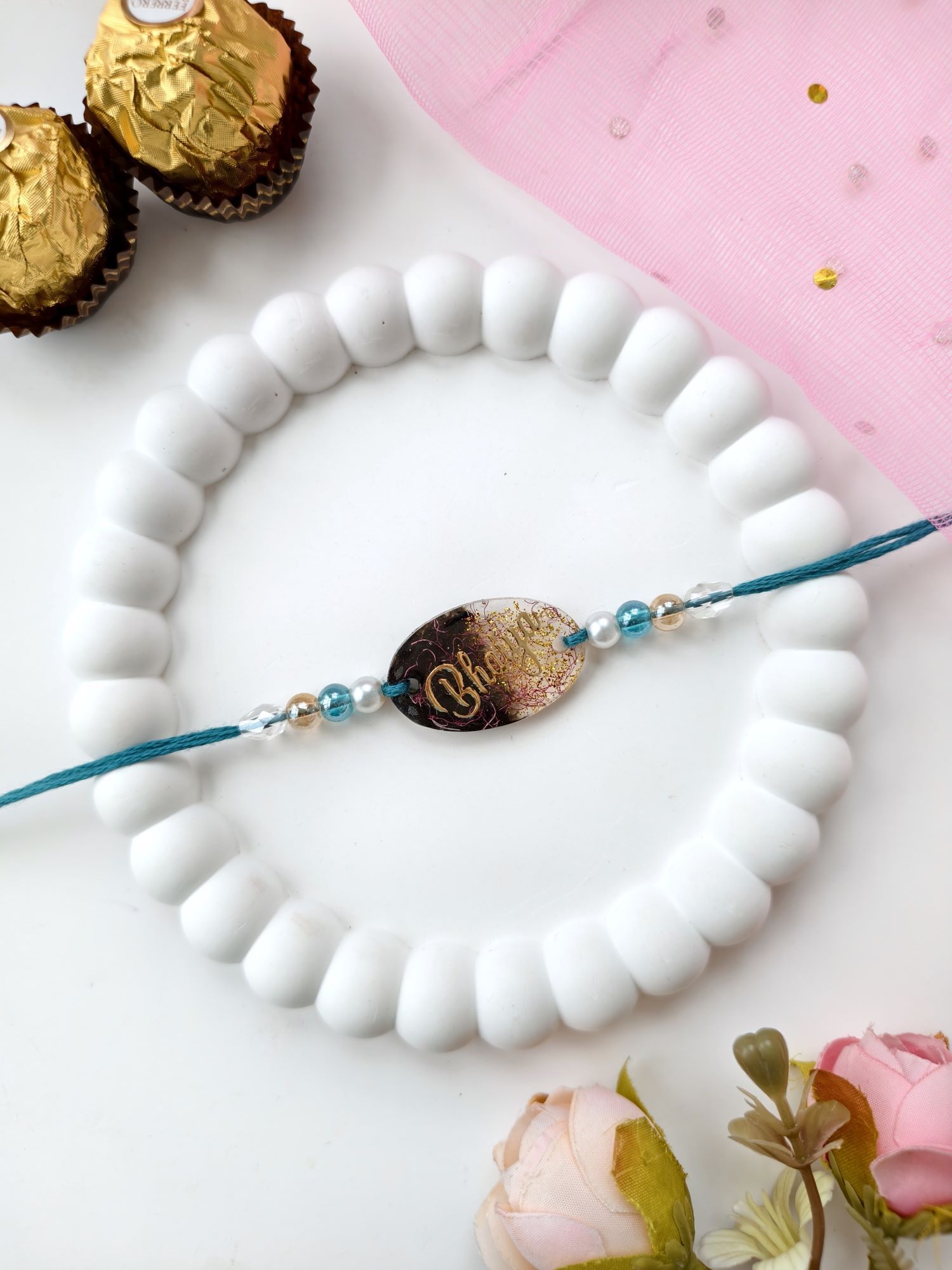 Handmade resin rakhi for brother with pearl beads, bhaiya rakhi