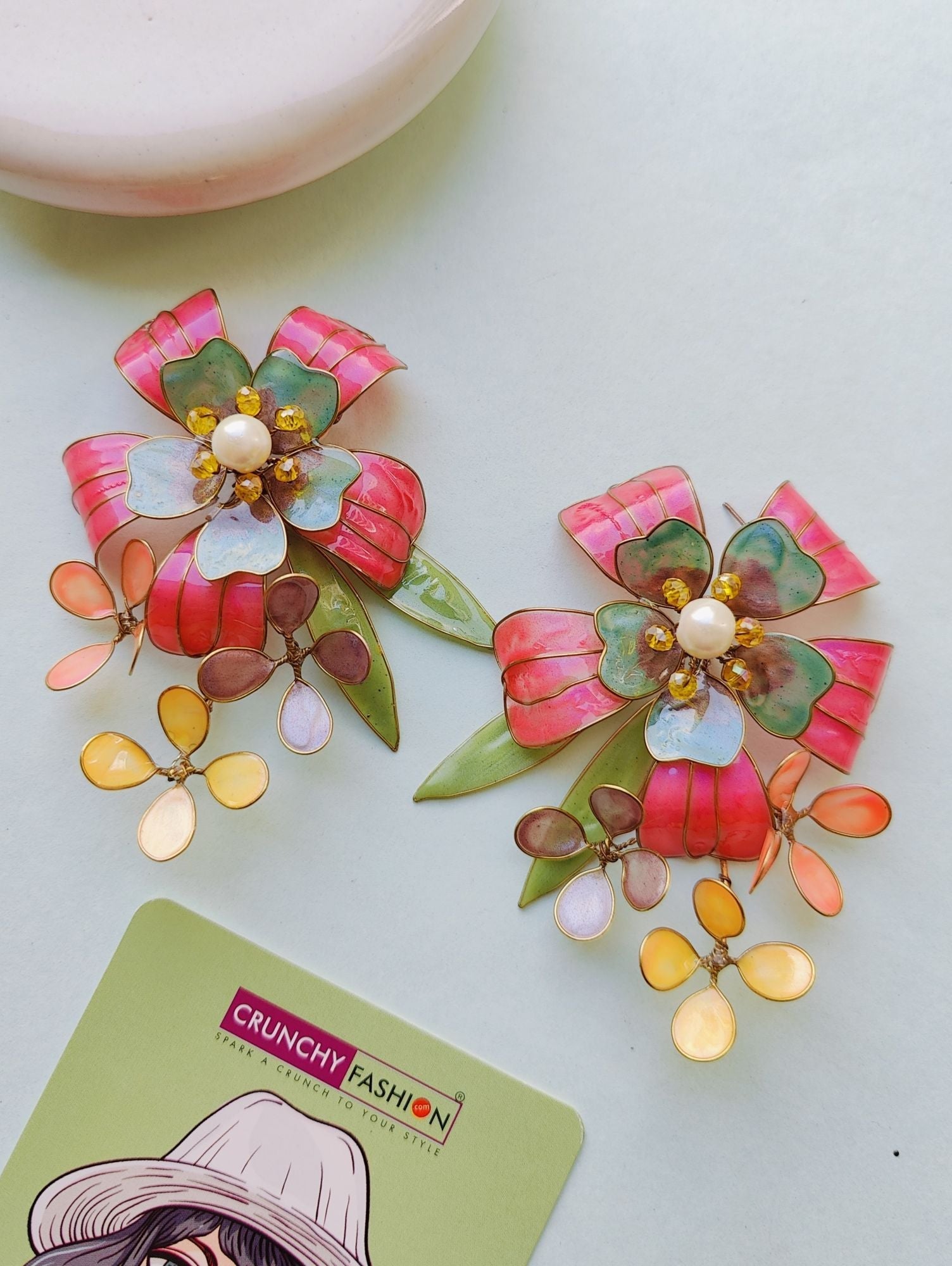 Colorful drop & dangler earrings featuring floral resin art, perfect for Haldi gatherings on any Shopify store.