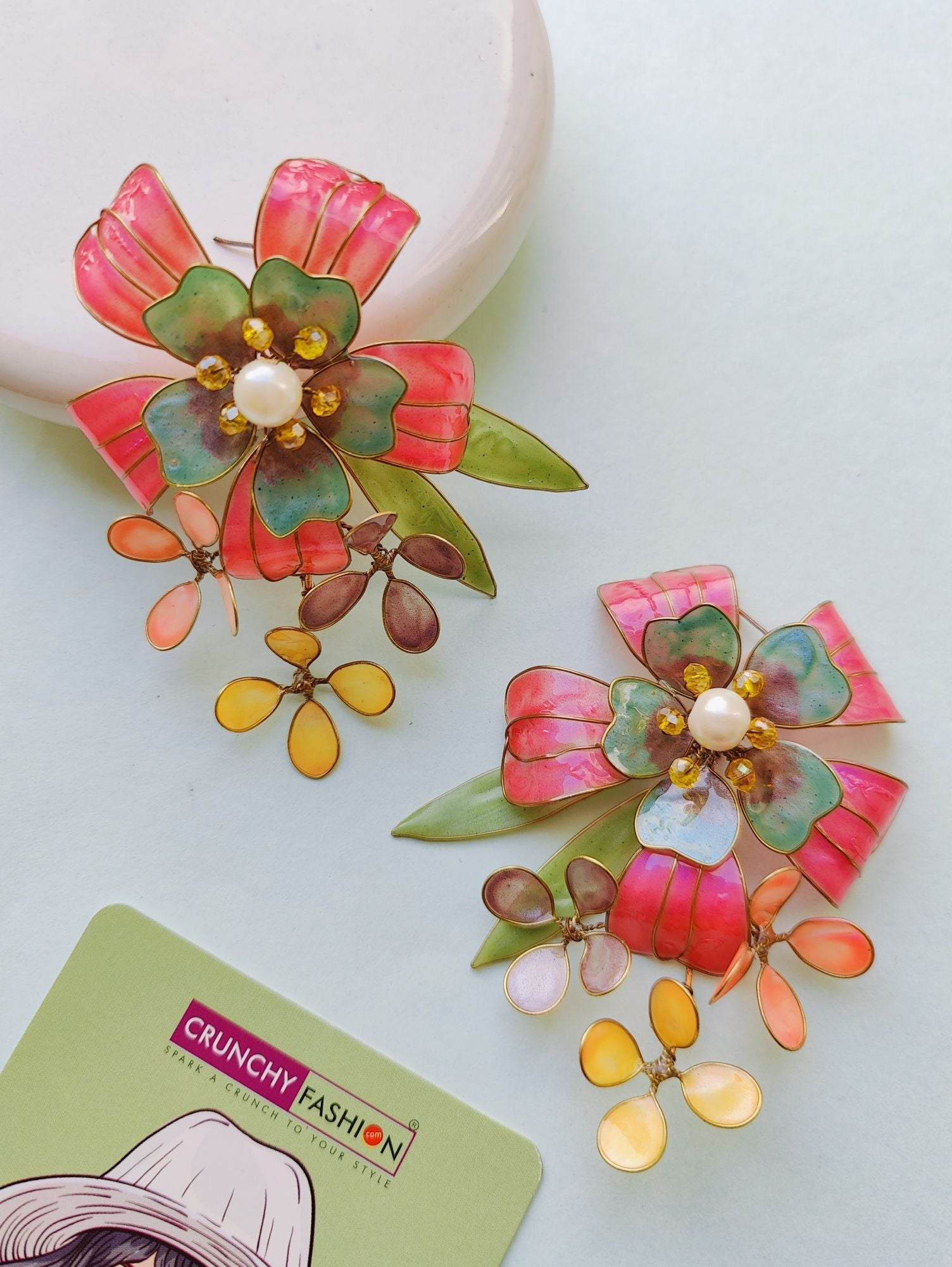 Colorful drop & dangler earrings featuring floral resin art, perfect for Haldi gatherings on any Shopify store.