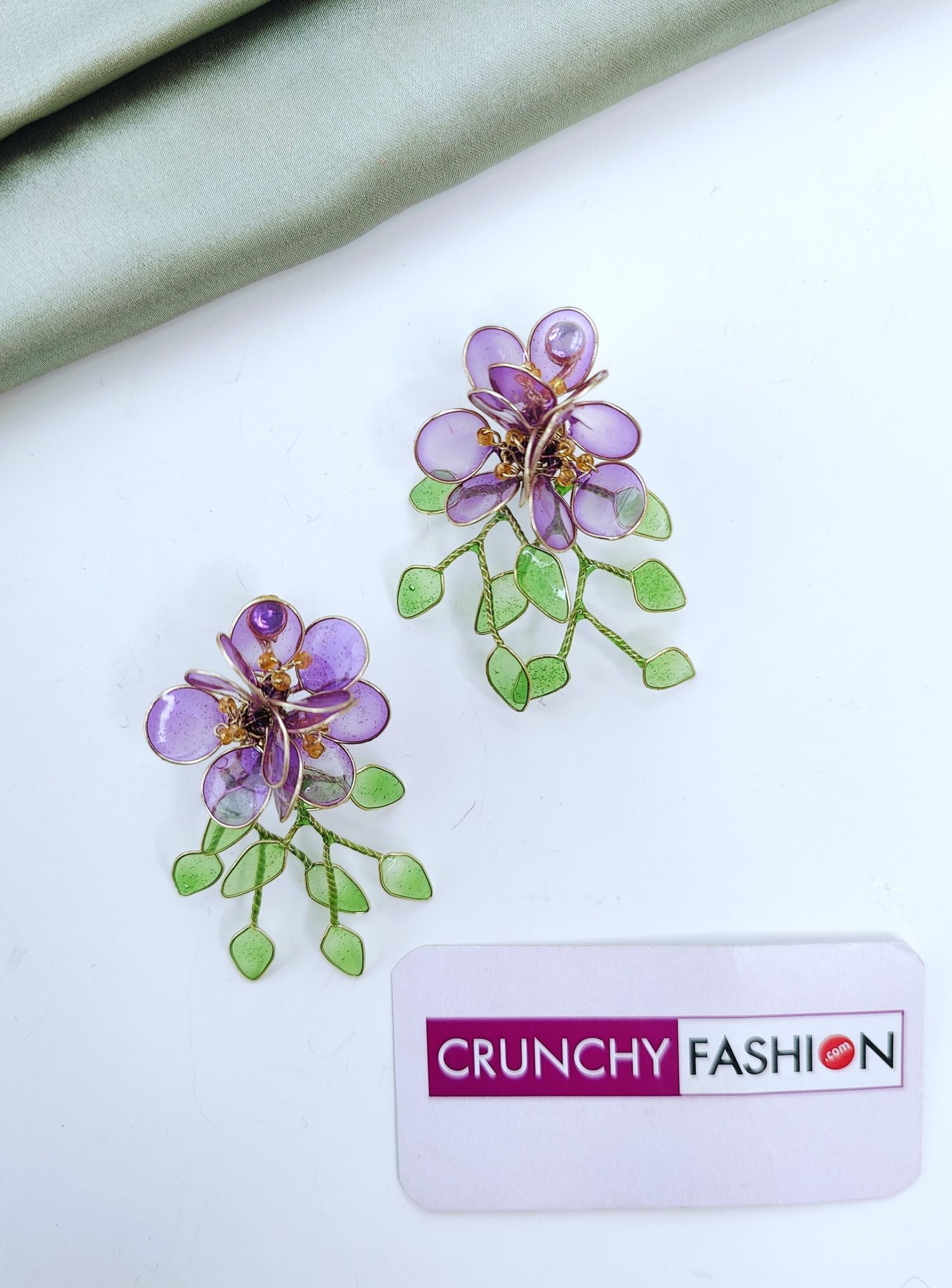Purple floral resin earrings with green leaves, lightweight studs