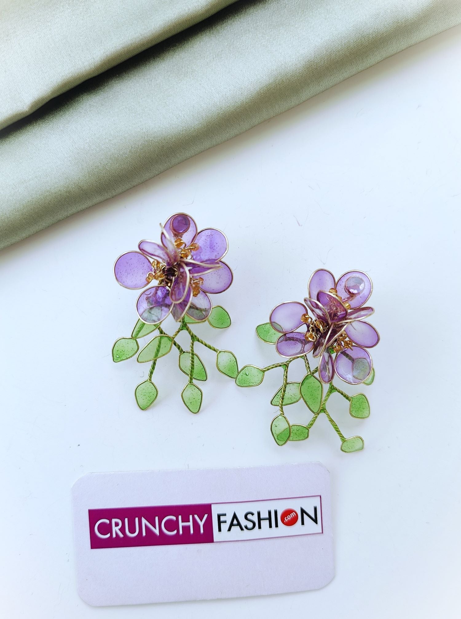 Purple floral resin earrings with green leaves, lightweight studs