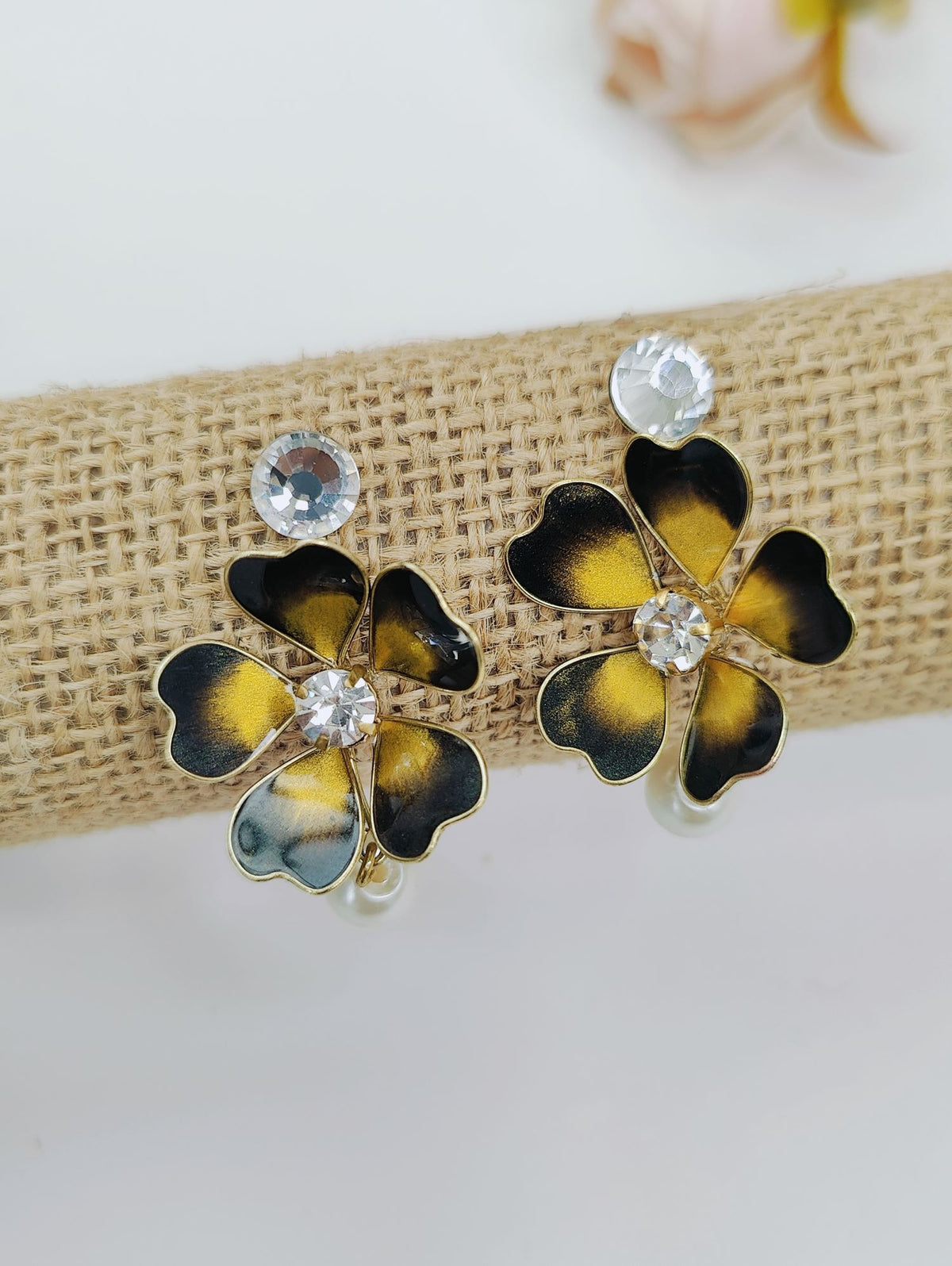 Black and gold floral resin dangler earrings for women