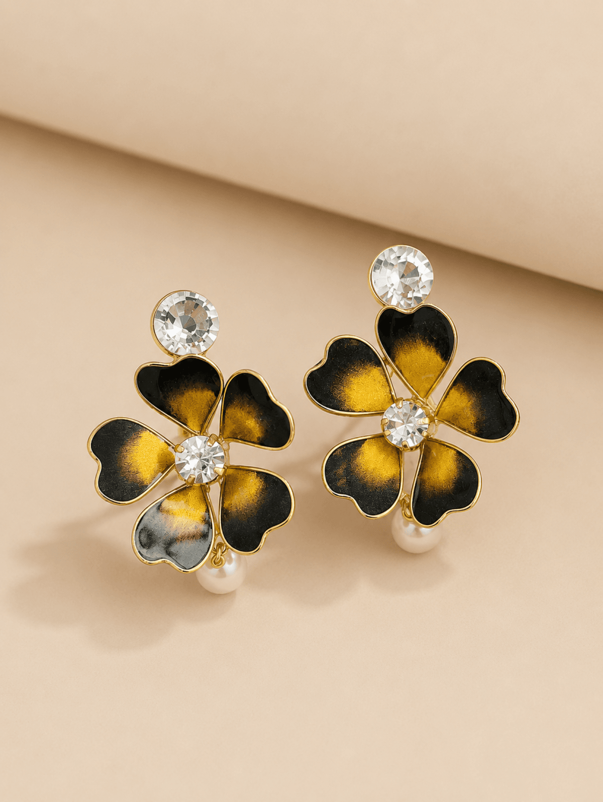 Black and gold floral resin dangler earrings for women