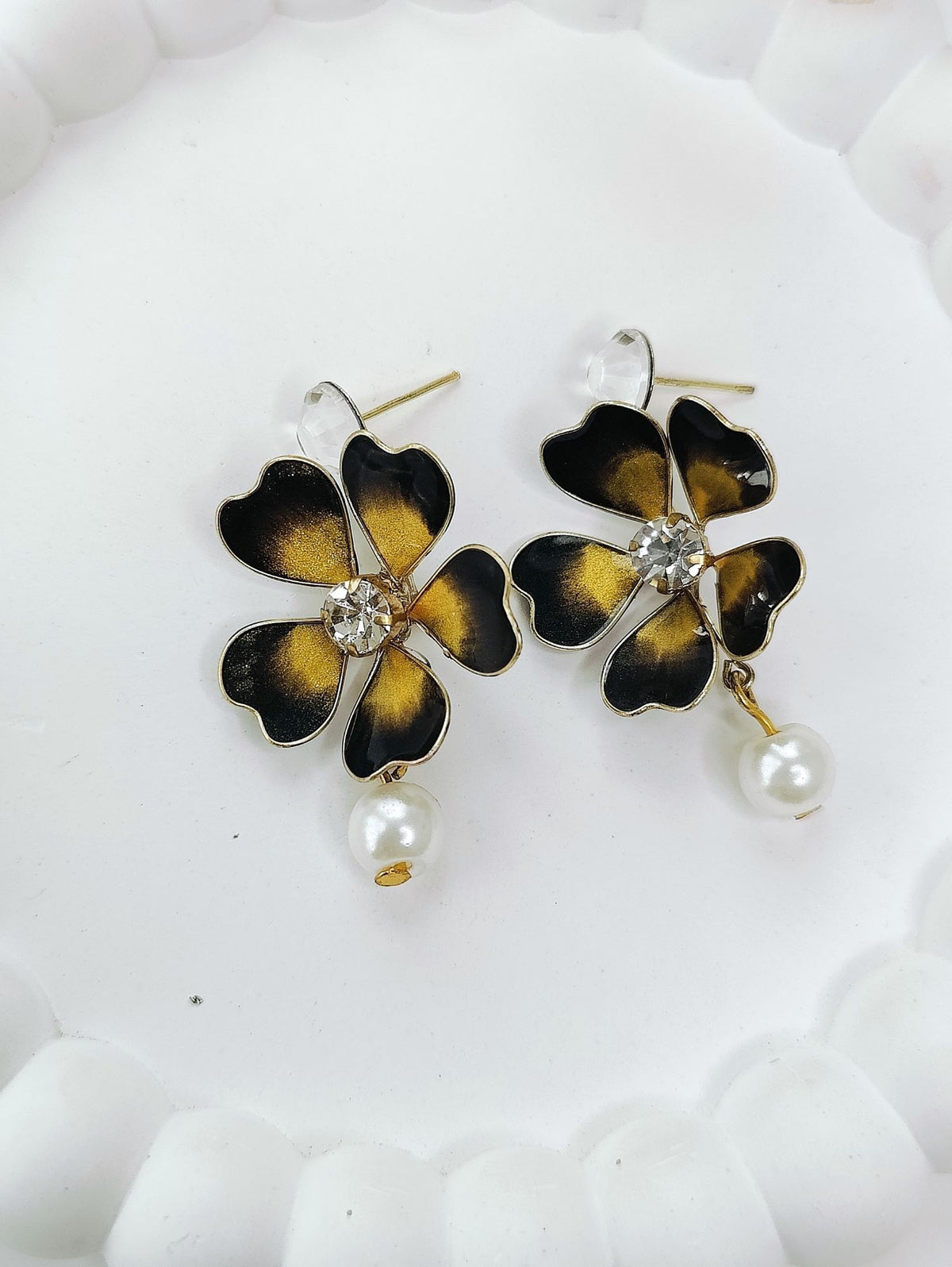 Black and gold floral resin dangler earrings for women