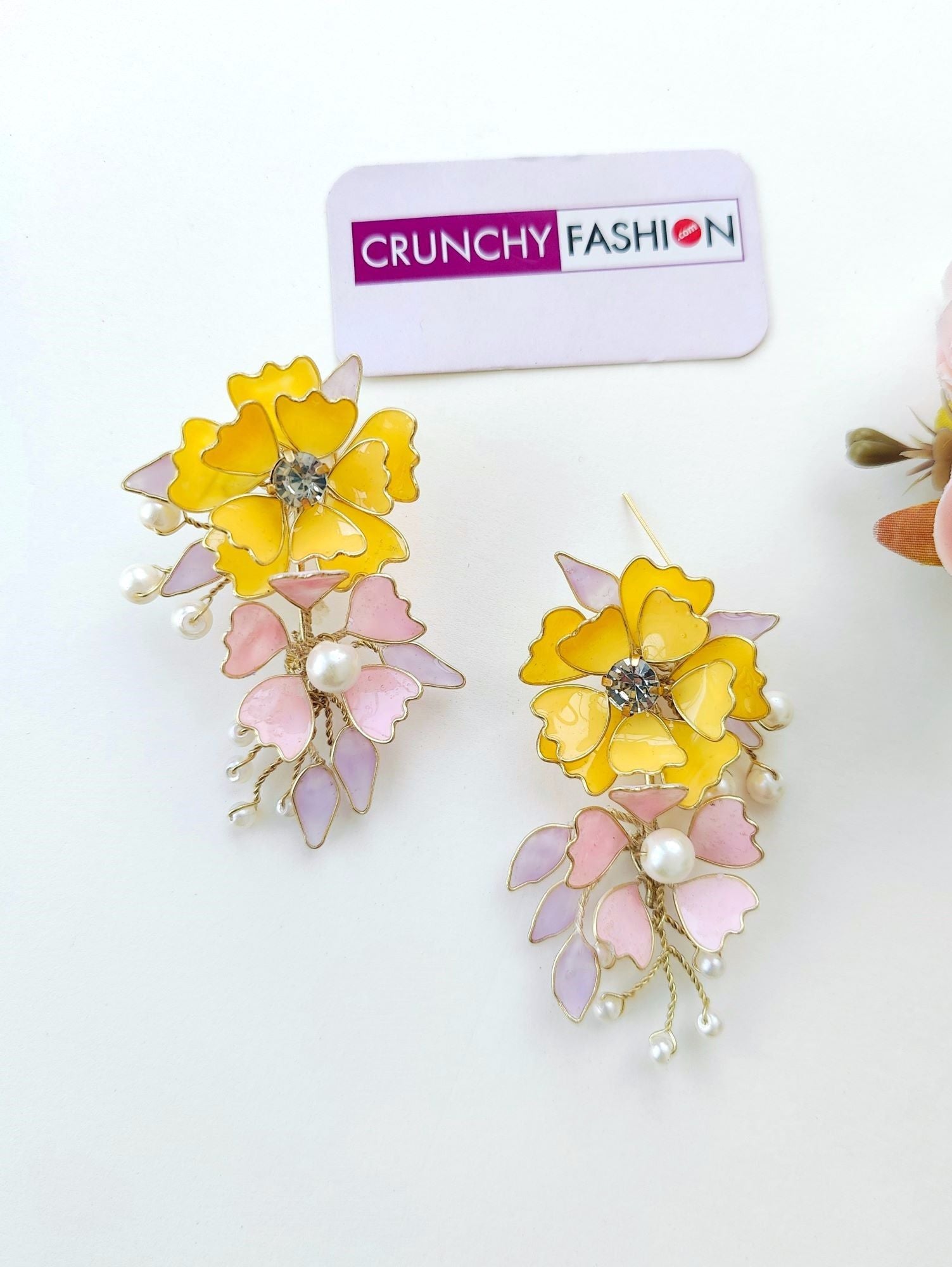 Handmade resin Carnival jewellery set with yellow and baby pink floral design, ideal for brides at haldi and mehndi 