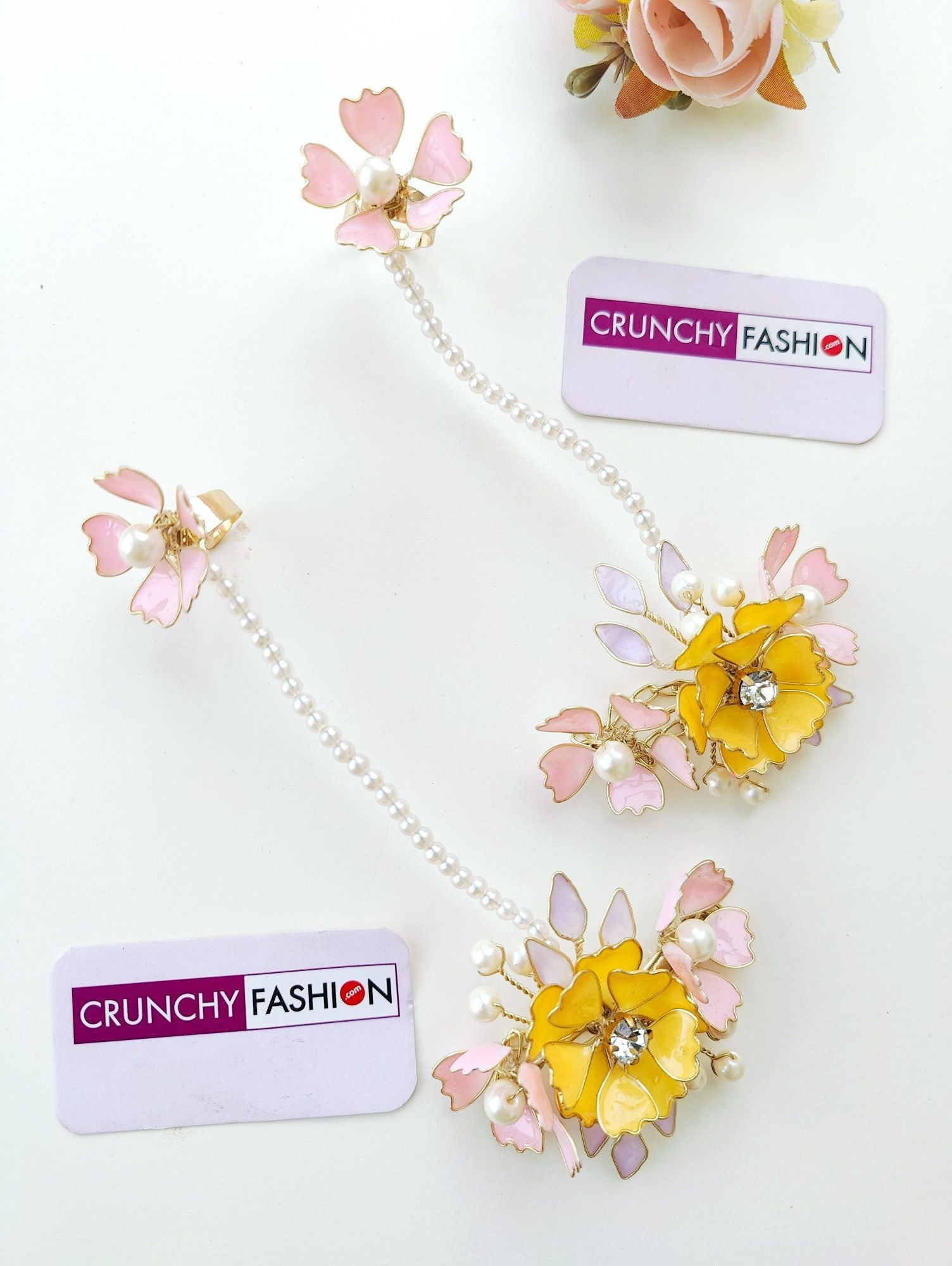 Handmade resin Carnival jewellery set with yellow and baby pink floral design, ideal for brides at haldi and mehndi 