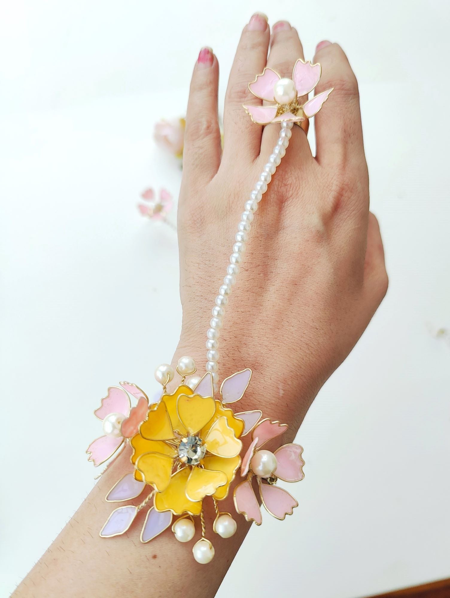 Handmade resin Carnival jewellery set with yellow and baby pink floral design, ideal for brides at haldi and mehndi 