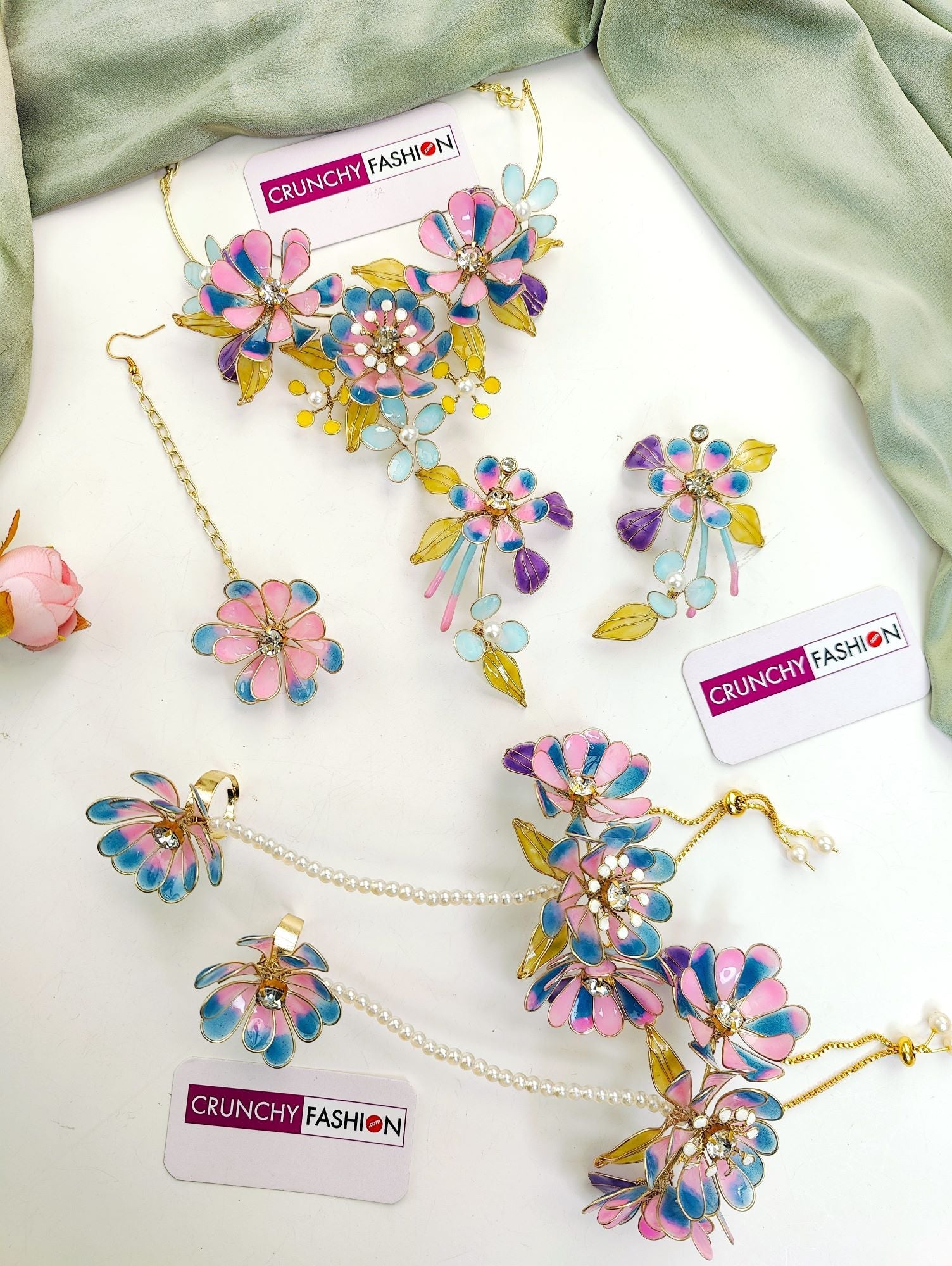 Handmade pink-turquoise bridal jewellery set with pastel floral design, ideal for haldi-mehndi ceremony