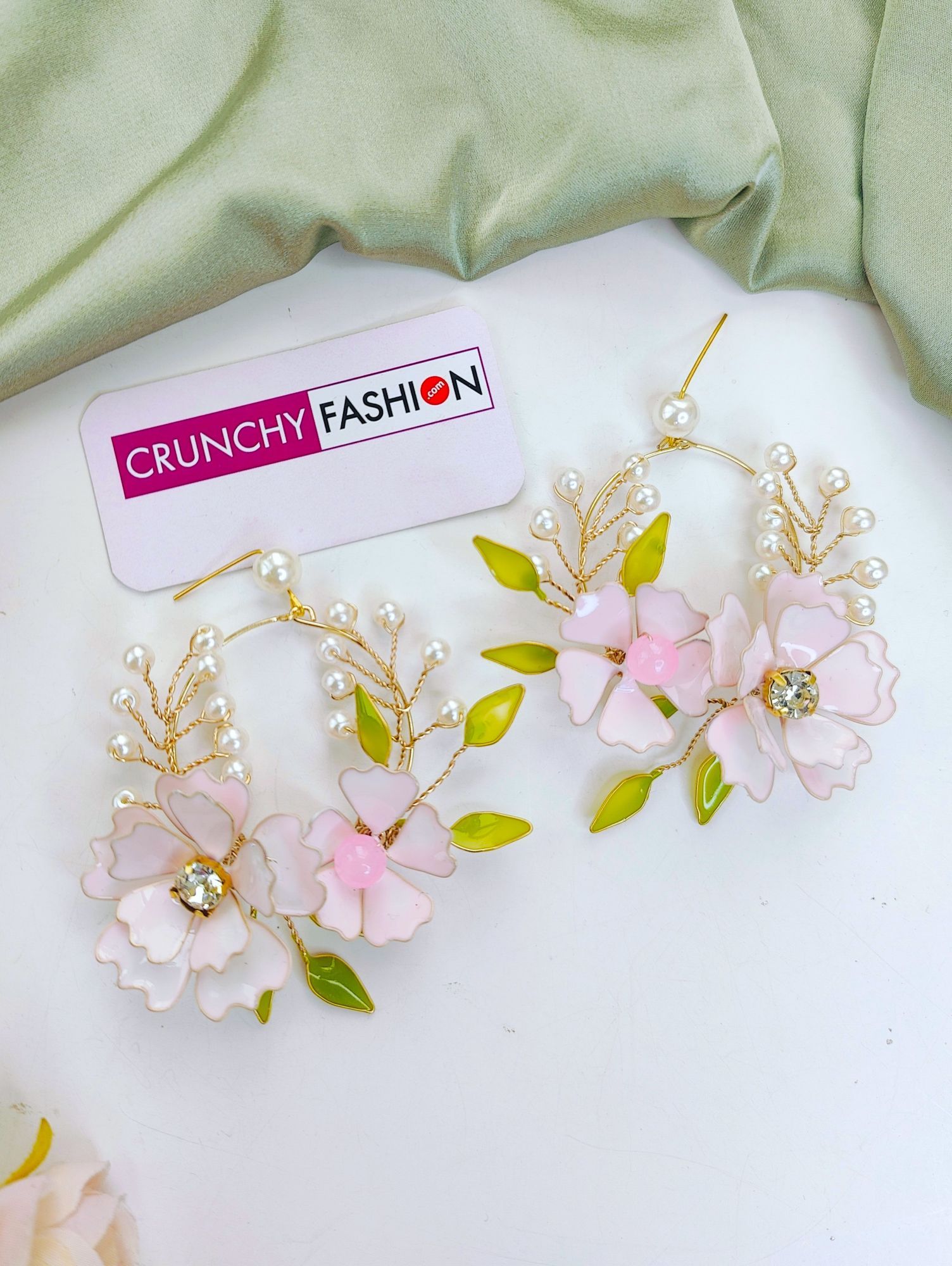 Handmade light pink floral resin jewellery set with gold plating, ideal for wedding events like haldi and mehndi