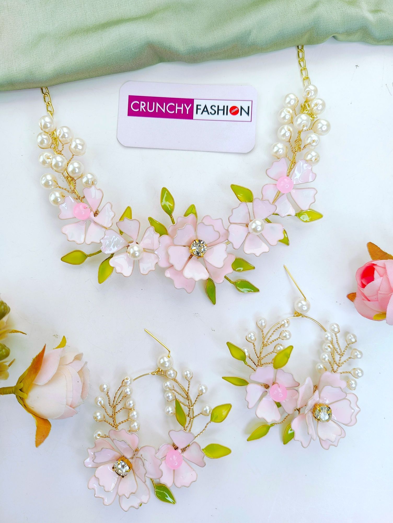 Handmade light pink floral resin jewellery set with gold plating, ideal for wedding events like haldi and mehndi