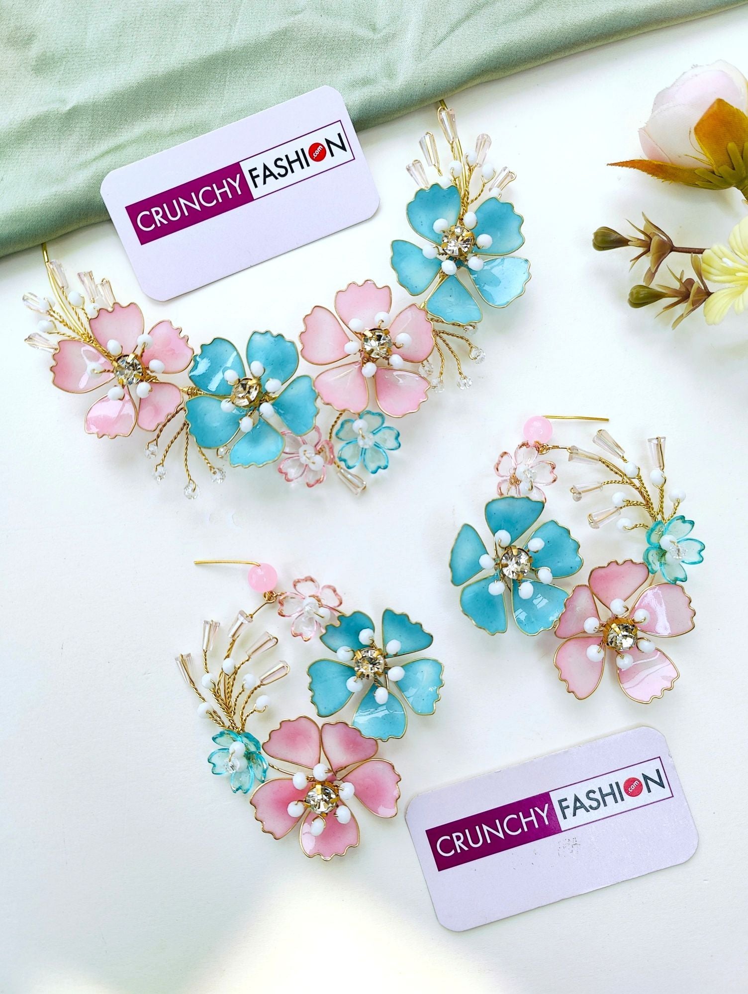 Handcrafted sky-blue resin floral jewelry set for women's haldi or mehndi, gold-plated with beaded details.