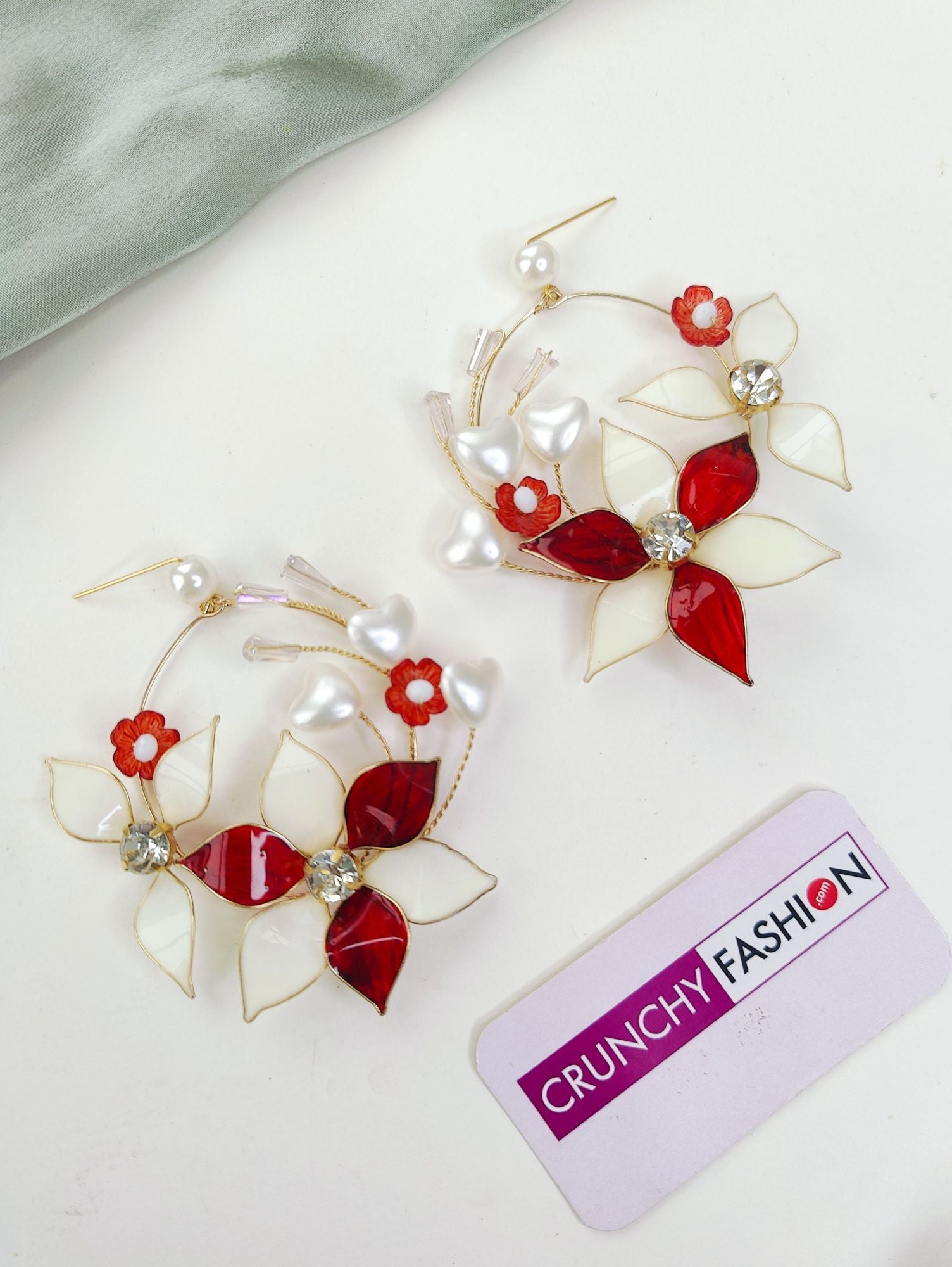 Handmade red-off white floral resin carnival jewellery set for brides, perfect for haldi-mehndi ceremonies