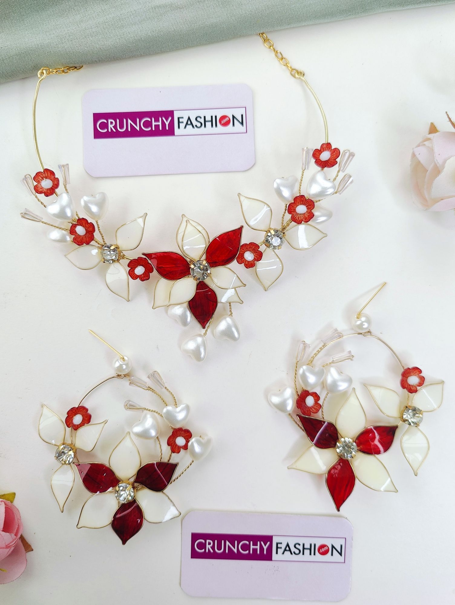 Handmade red-off white floral resin carnival jewellery set for brides, perfect for haldi-mehndi ceremonies
