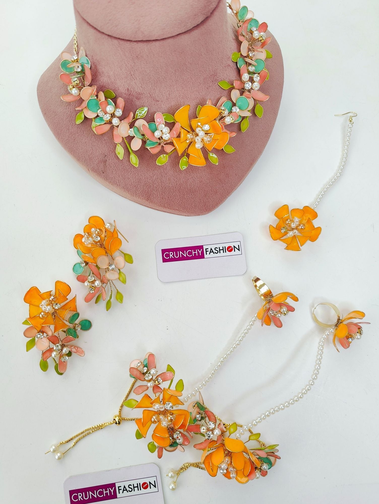 Handmade orange-pink floral resin carnival jewellery set, ideal for women on haldi-mehndi weddings.