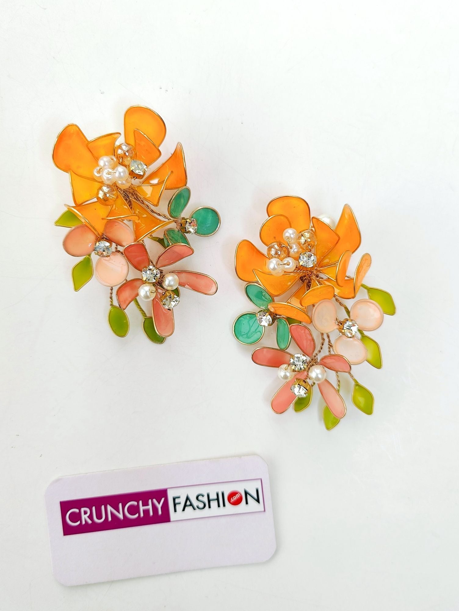 Handmade orange-pink floral resin carnival jewellery set, ideal for women on haldi-mehndi weddings.