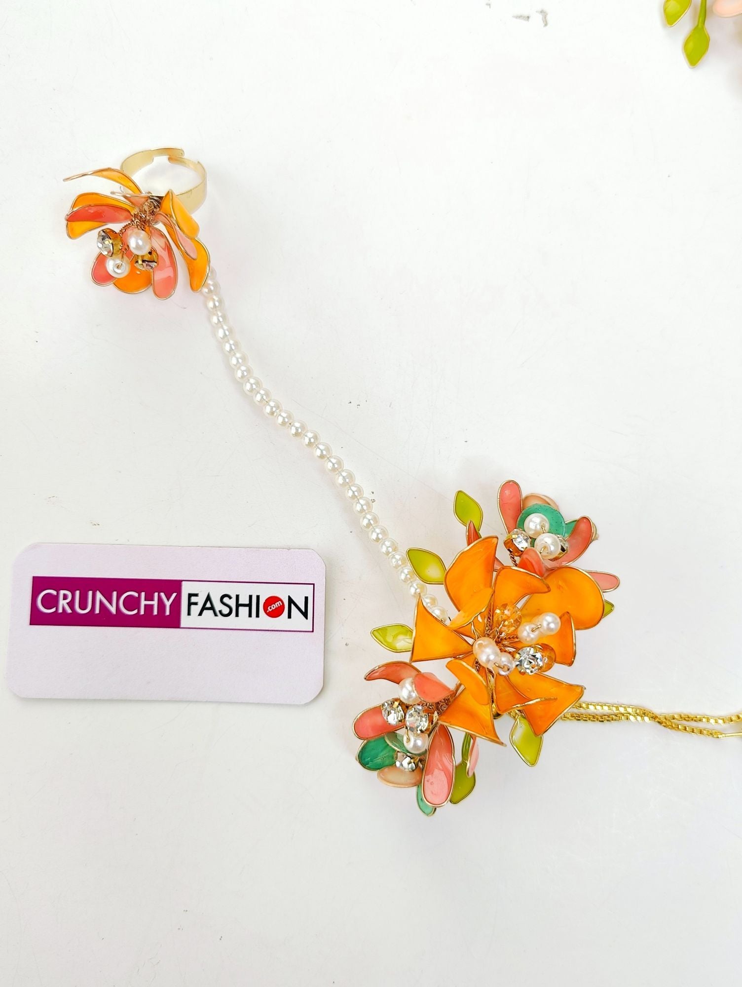 Handmade orange-pink floral resin carnival jewellery set, ideal for women on haldi-mehndi weddings.