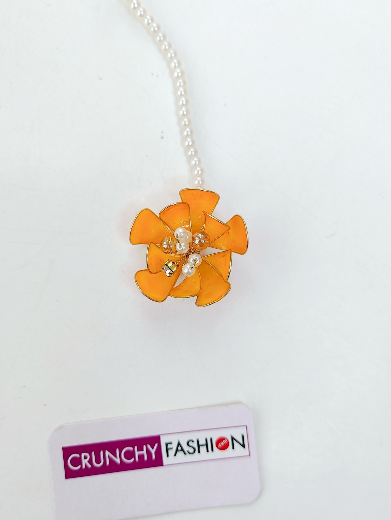 Handmade orange-pink floral resin carnival jewellery set, ideal for women on haldi-mehndi weddings.