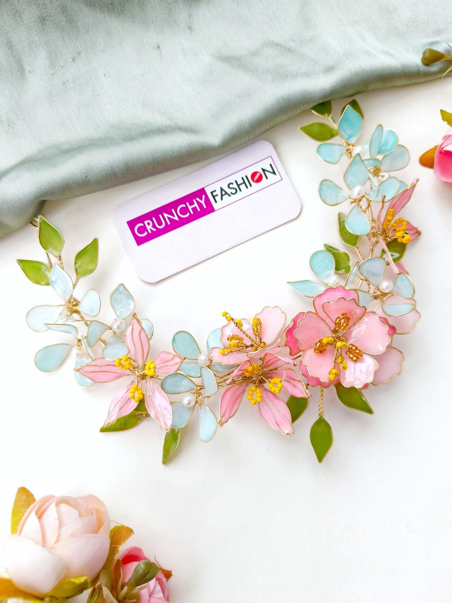 Handmade pastel pink comma powder blue floral resin jewellery with gold plating for brides at haldi & mehndi.