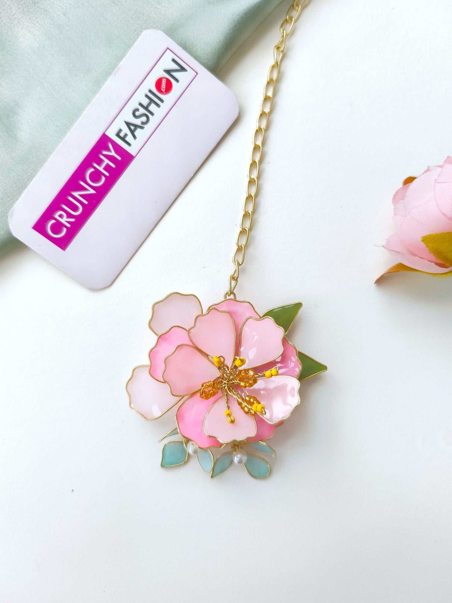 Handmade pastel pink comma powder blue floral resin jewellery with gold plating for brides at haldi & mehndi.