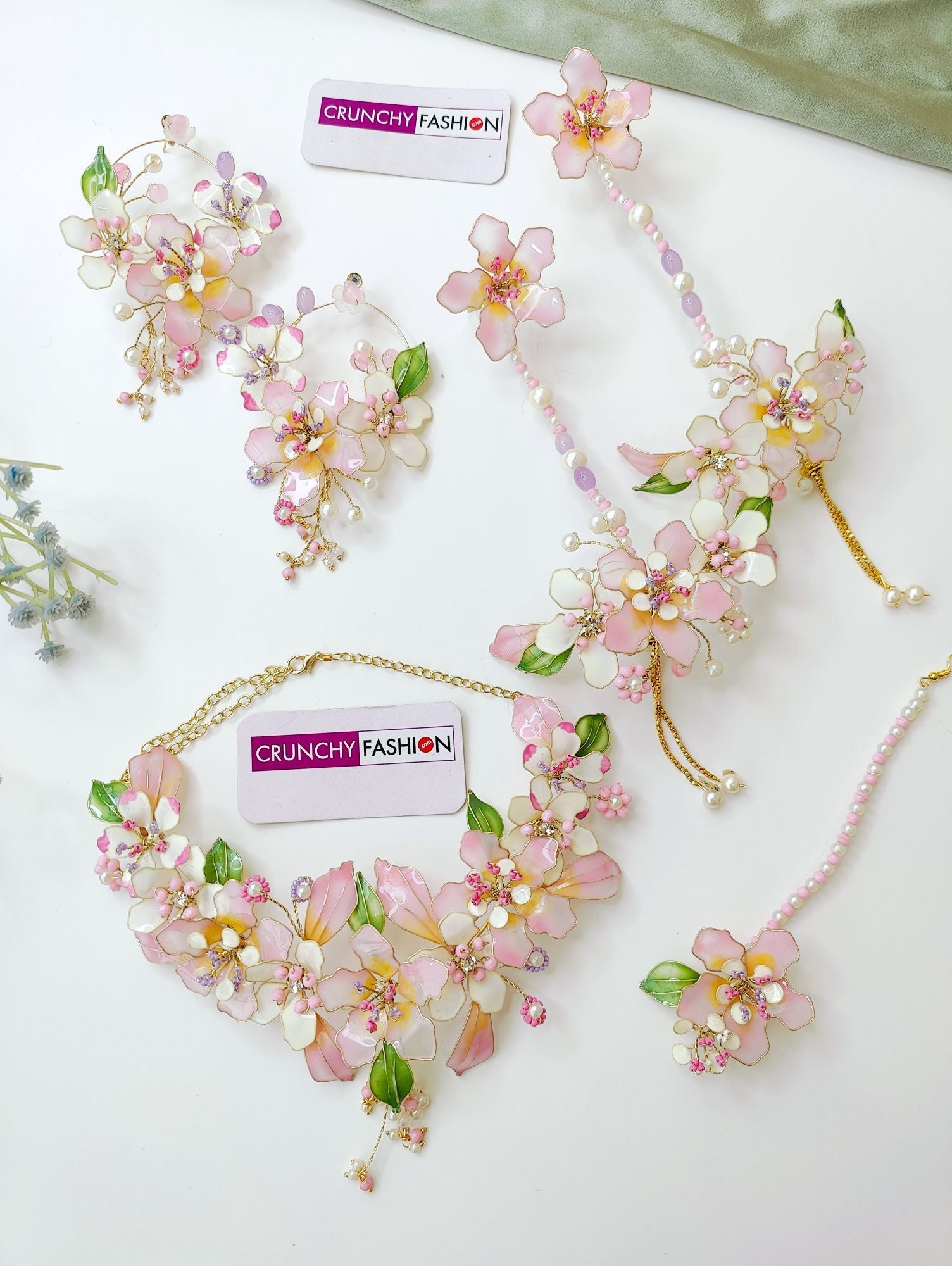 Pastel pink floral bridal jewellery set for haldi mehndi brides