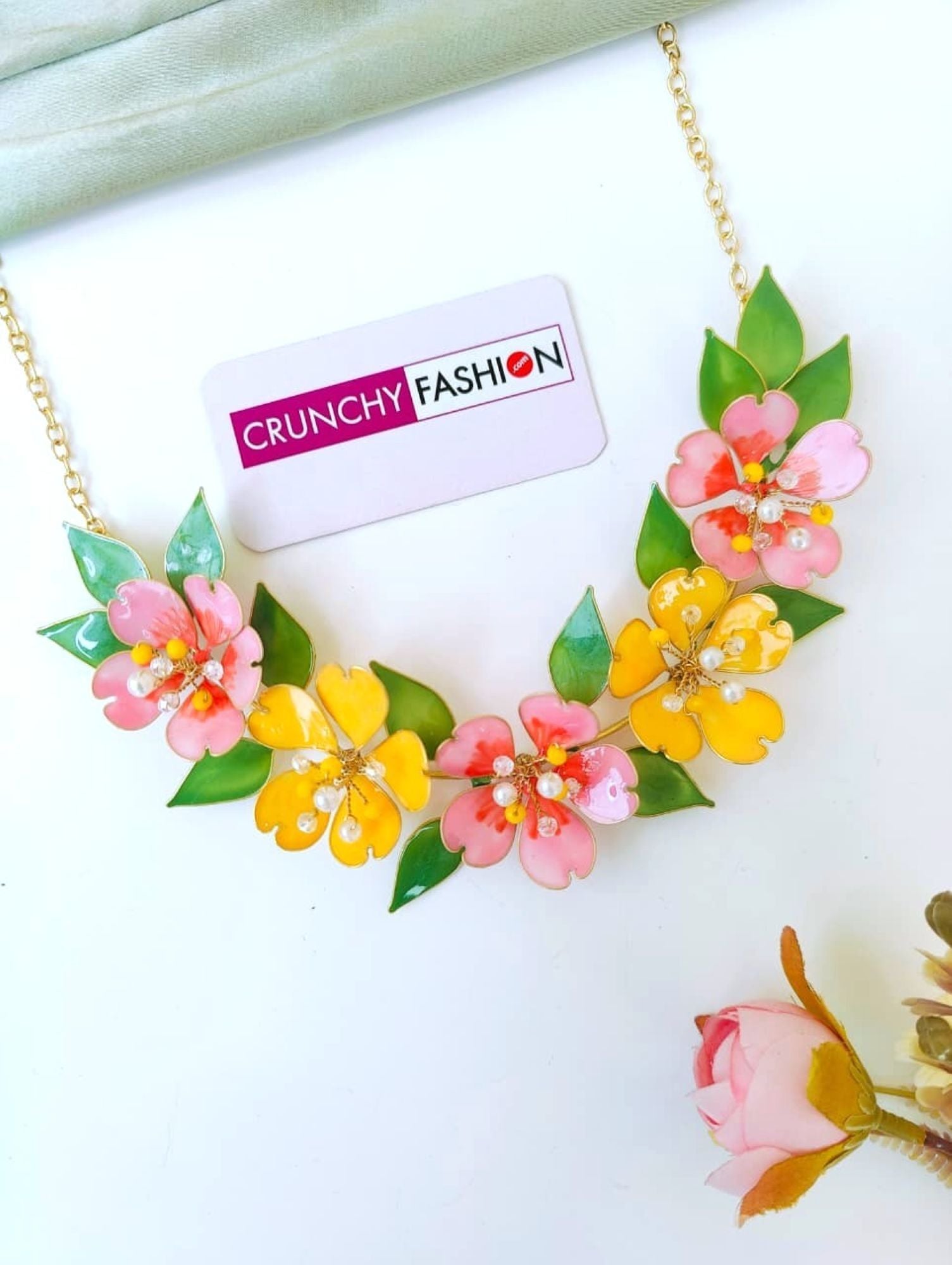 Pastel pink-yellow floral bridal haldi jewellery set for brides