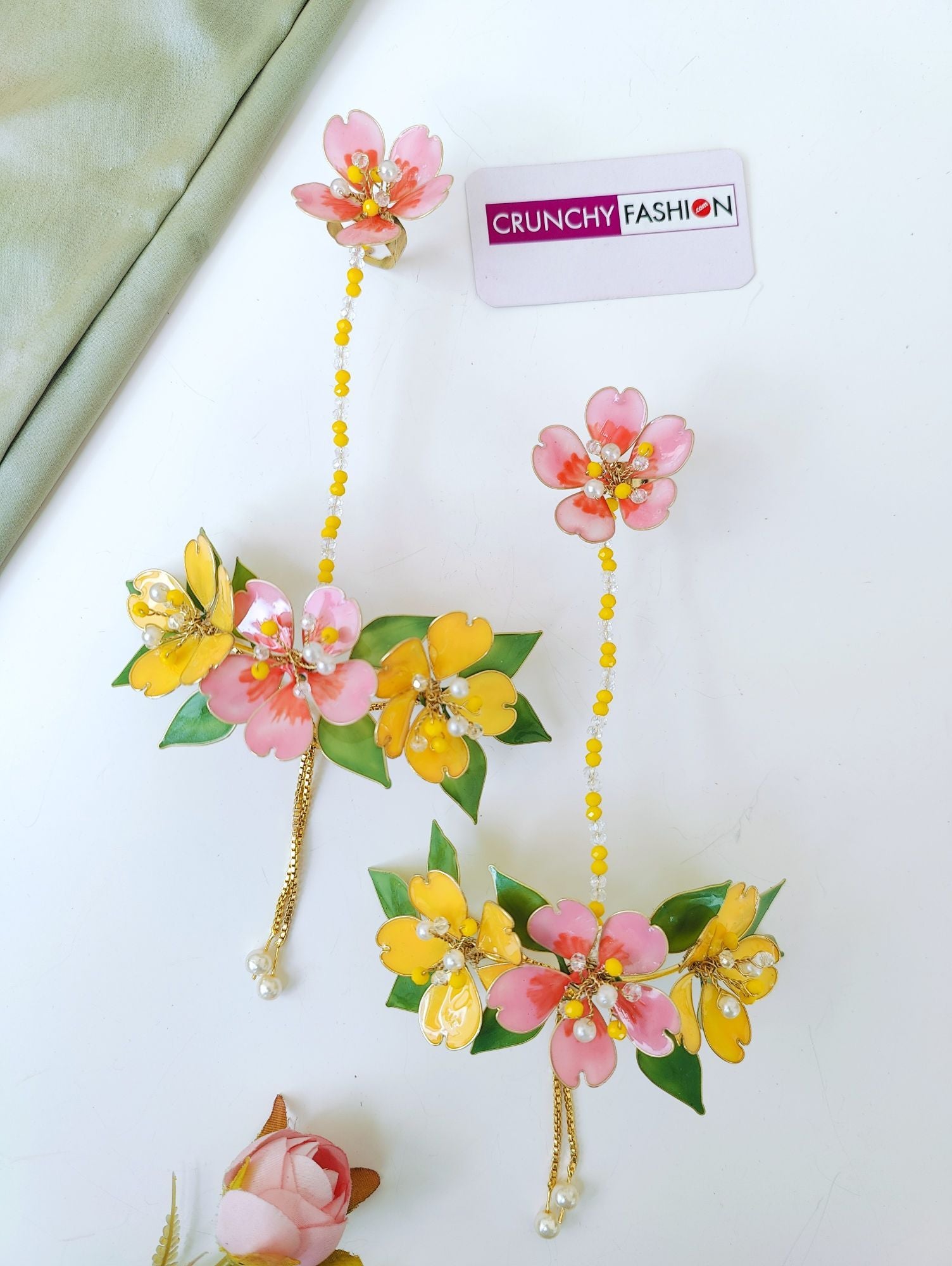 Pastel pink-yellow floral bridal haldi jewellery set for brides