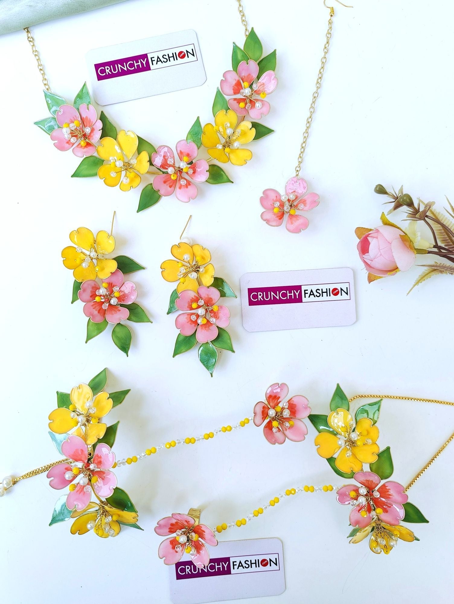 Pastel pink-yellow floral bridal haldi jewellery set for brides