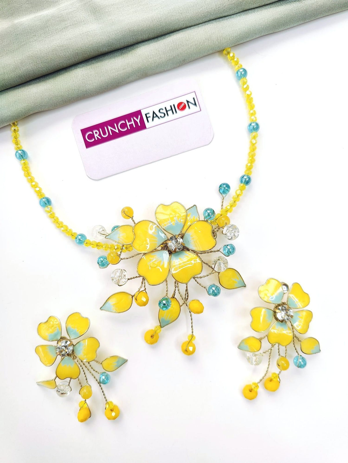 Yellow and blue floral resin jewellery set for haldi brides 2026