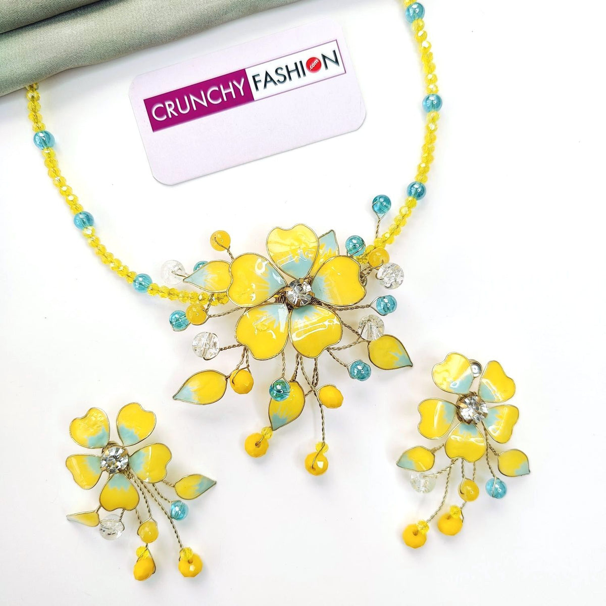 Yellow and blue floral resin jewellery set for haldi brides 2026