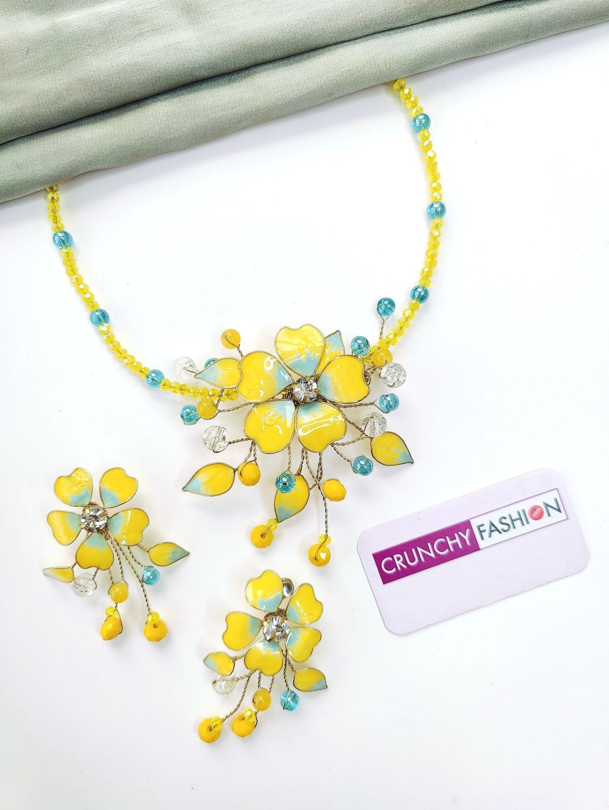 Yellow and blue floral resin jewellery set for haldi brides 2026