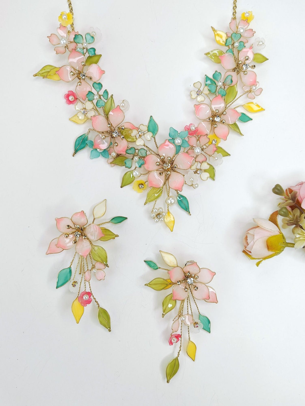 Designer resin floral bridal jewellery set in yellow, green, pink