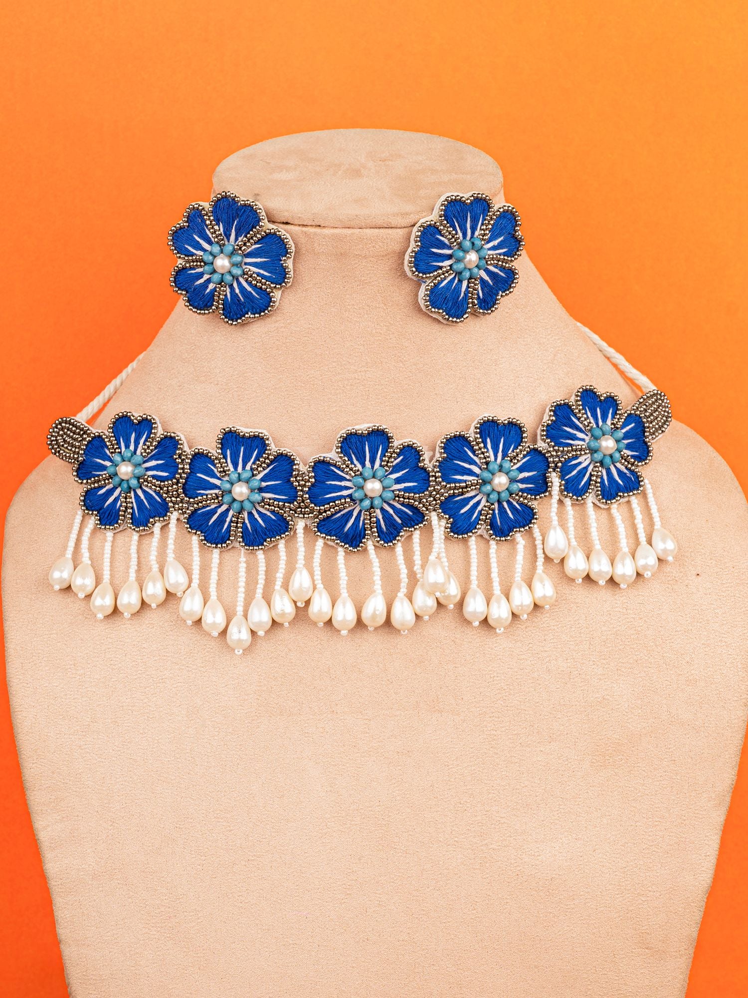 Handmade flower shape stud earrings in blue and white color ideal for women and girls