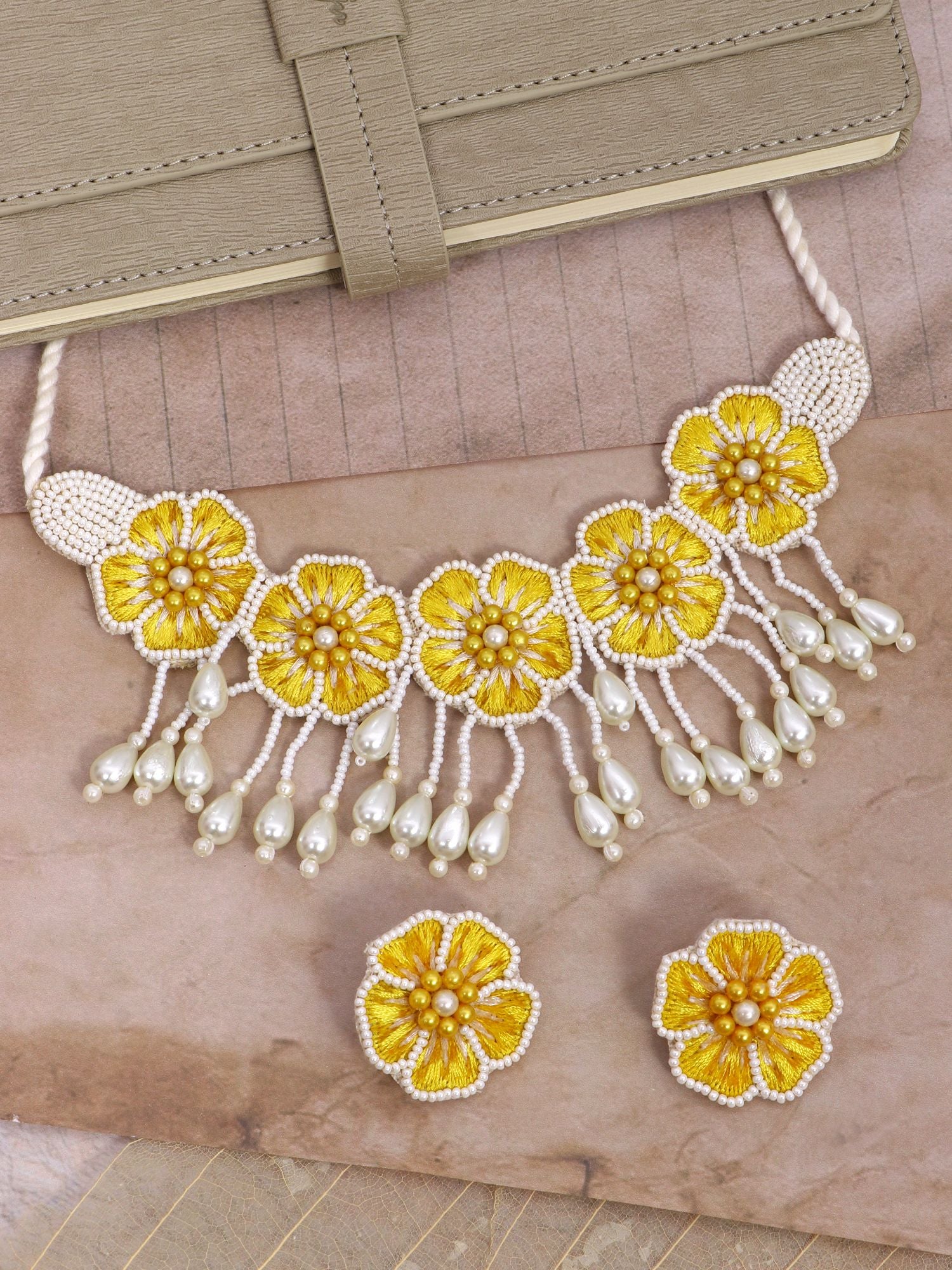 Floral themed choker necklace in yellow and white, ideal for everyday wear, handmade from base beads