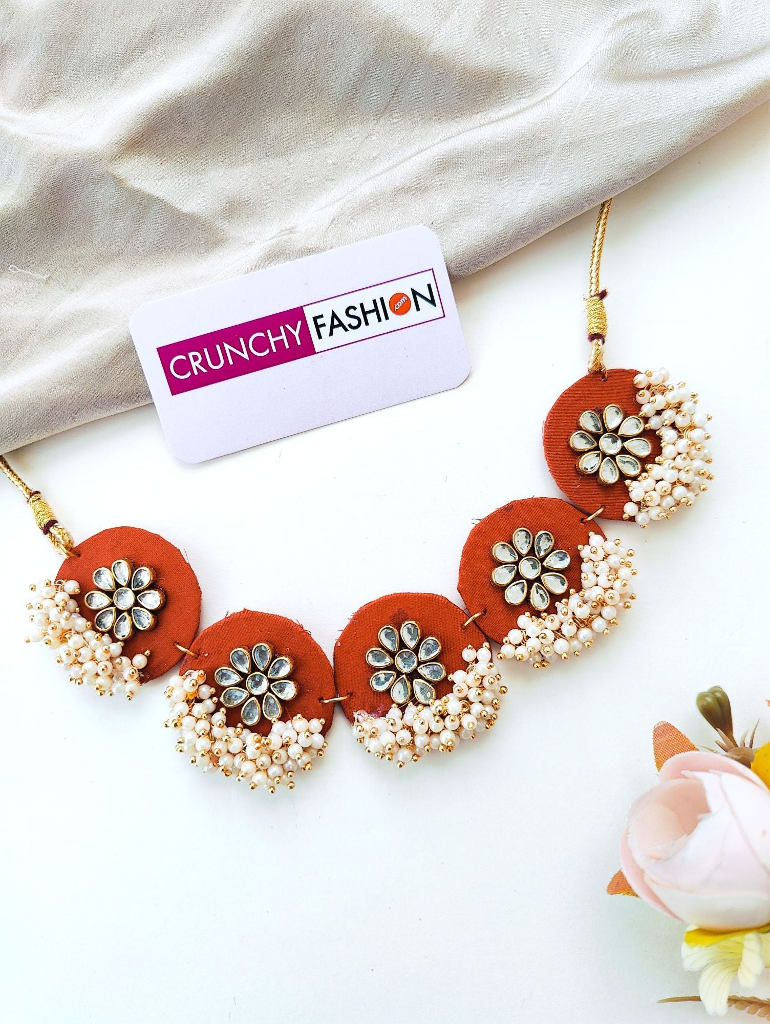 Rusted orange haldi mehndi bridal flower jewellery set for brides