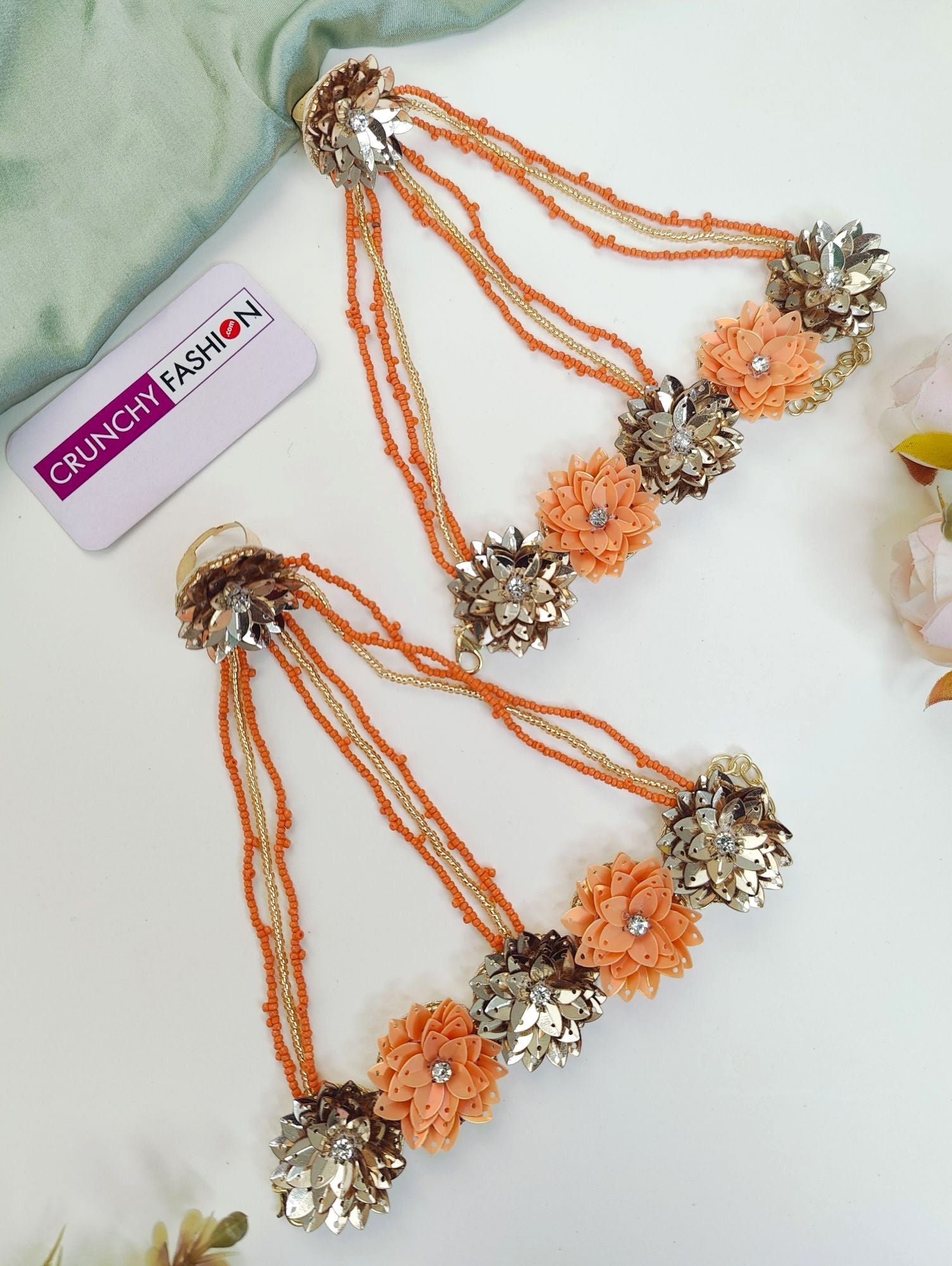 New, handmade Haldi-Mehndi floral jewellery set, with orange multi coloured necklace, earrings, and bracelet ideal for women and girls during festivals, parties or weddings.