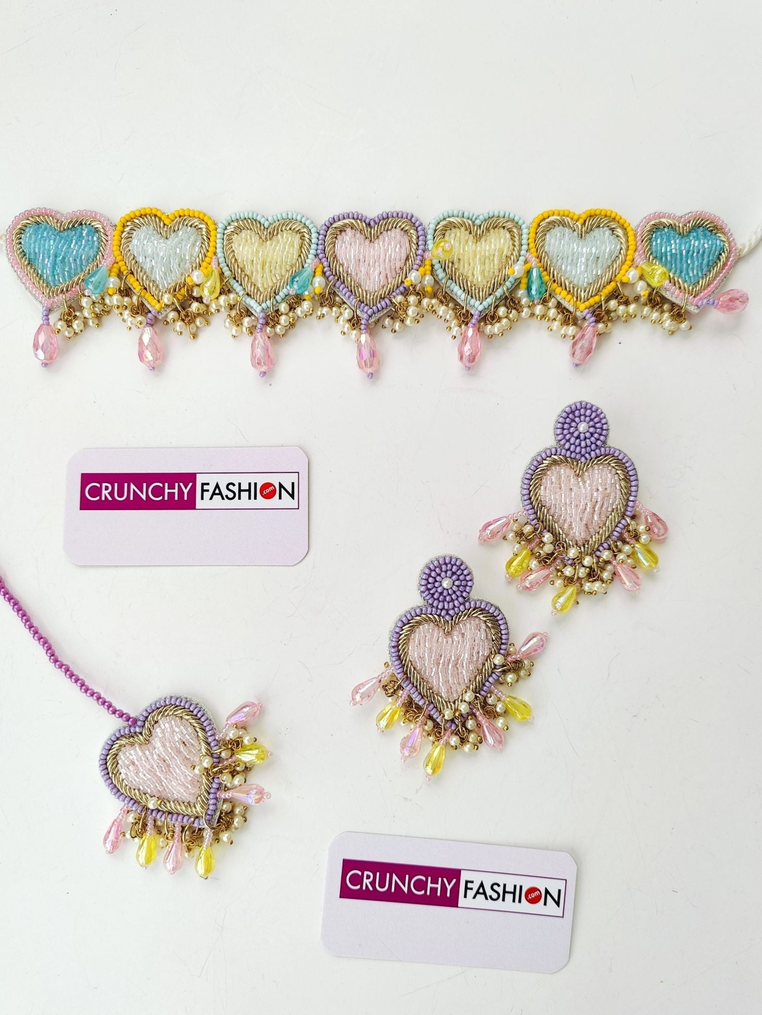Handmade pastel hearts jewellery set in yellow, green, pink, and lavender for haldi-mehndi, ideal for women