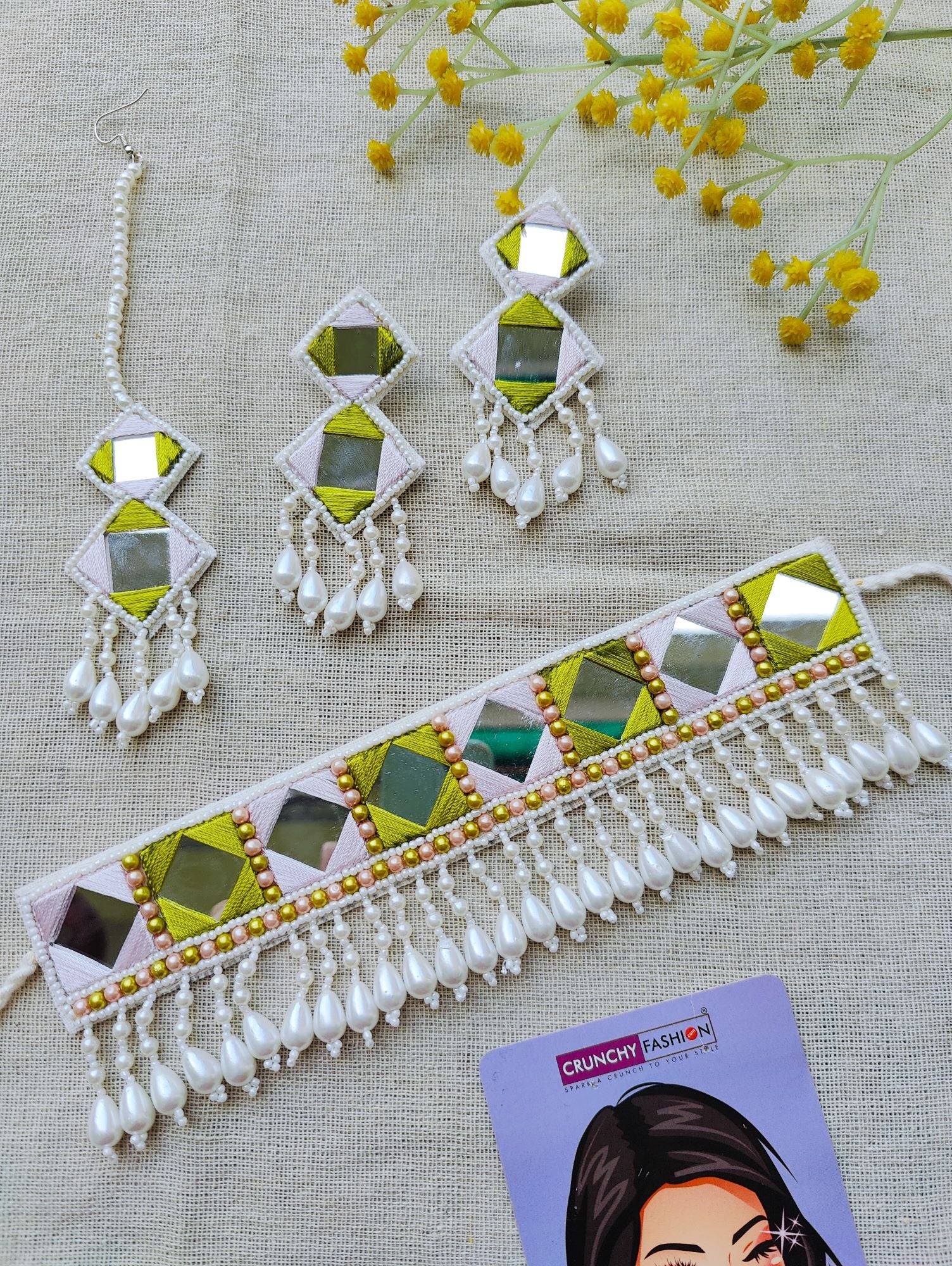 Green and white handmade haldi mehndi jewellery set for bride featuring beaded, pearl and thread materials, ideal for wedding and mehndi occasions.