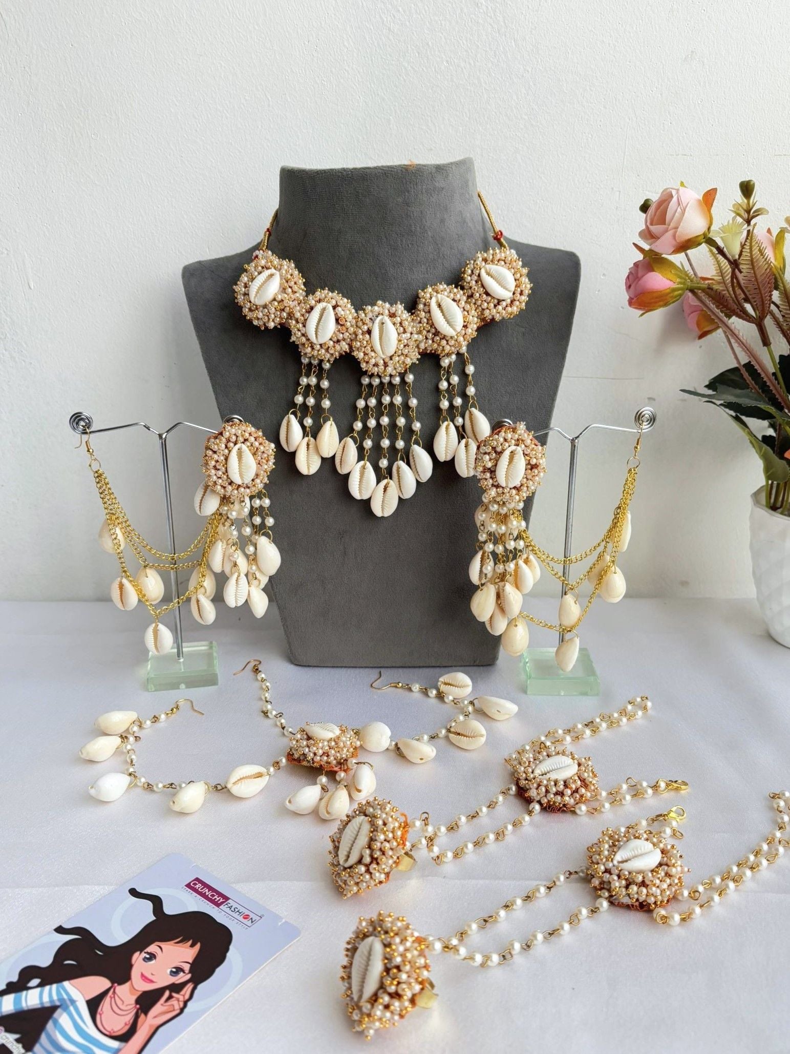 Multicolor ethnic floral jewellery set with pearls and cowrie shells for haldi and mehndi