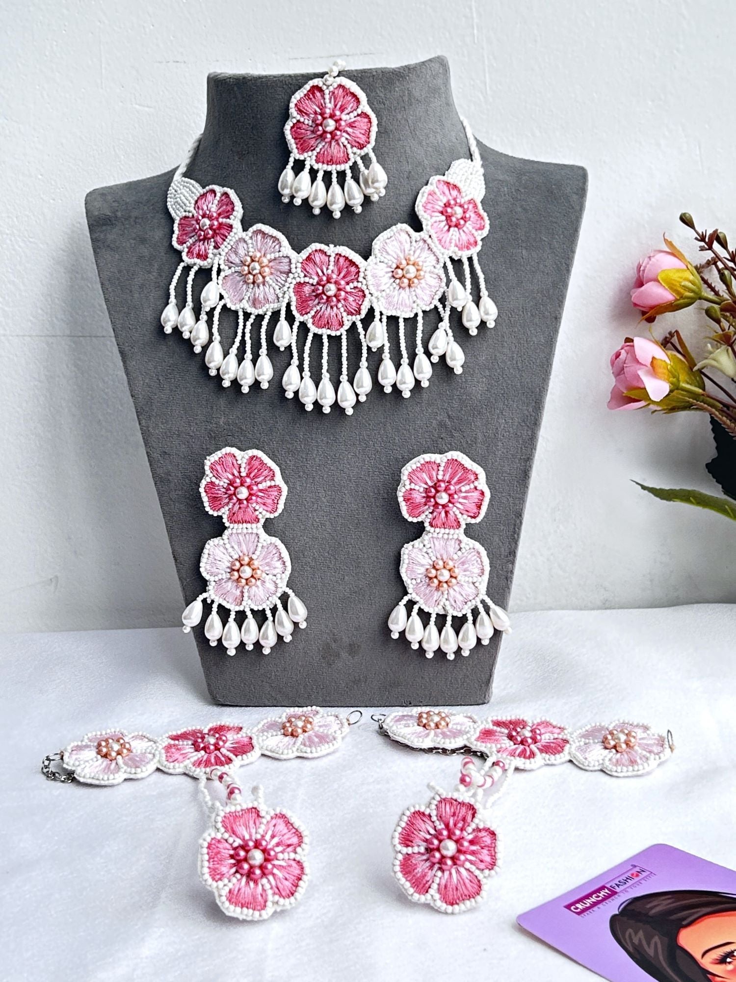 Contemporary asymmetric design, Pink-BabyPink Haldi Mehndi women's jewellery set with silver-plated base beads and floral theme, ideal for wedding, party and religious occasions