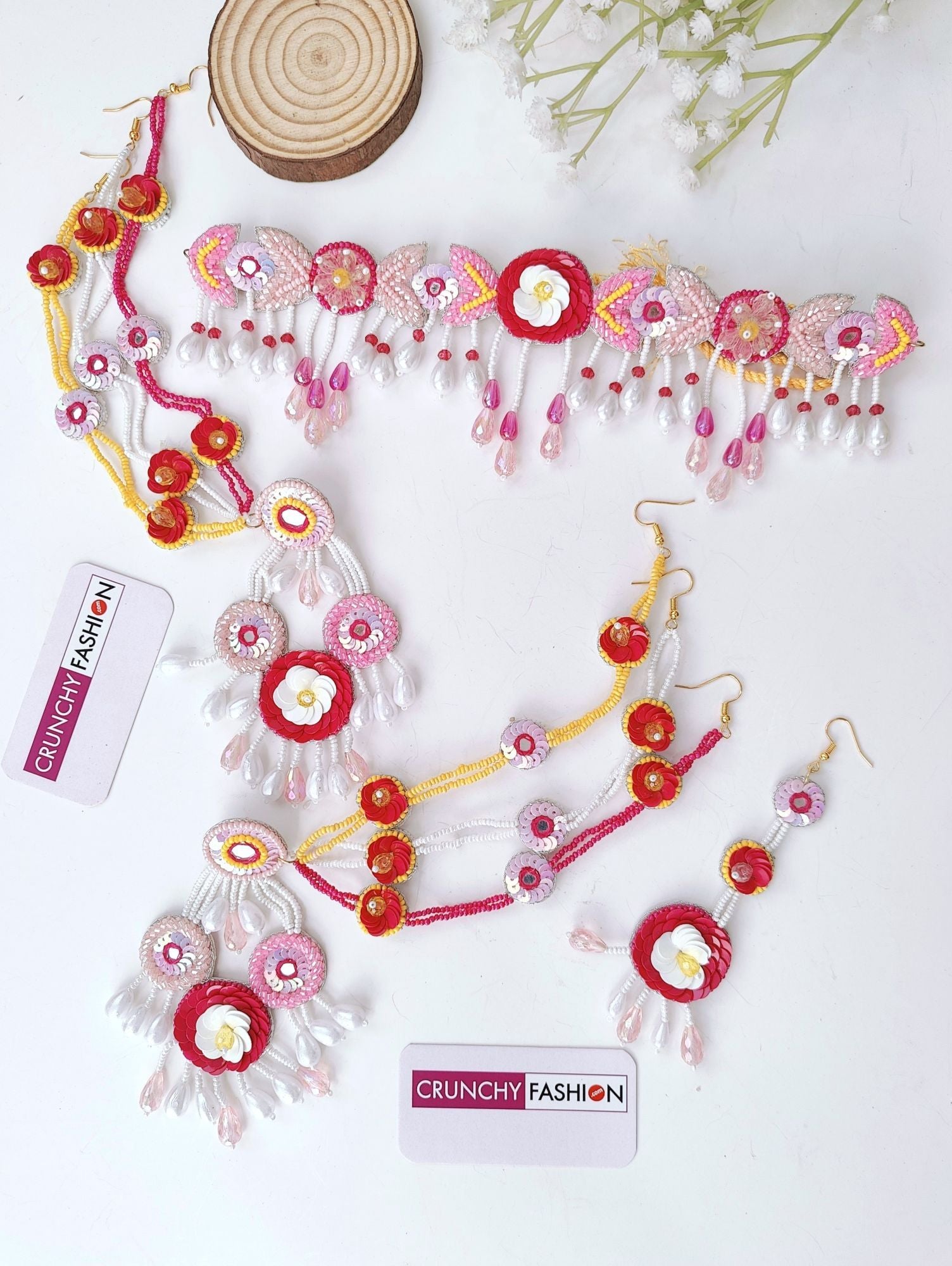 Handcrafted pink-white floral beaded jewellery set ideal for brides at haldi-mehndi functions